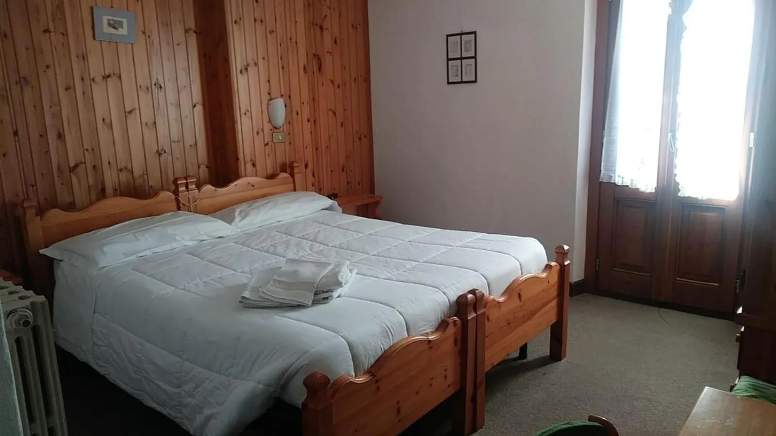 Bedroom in Hotel Beau Sejour