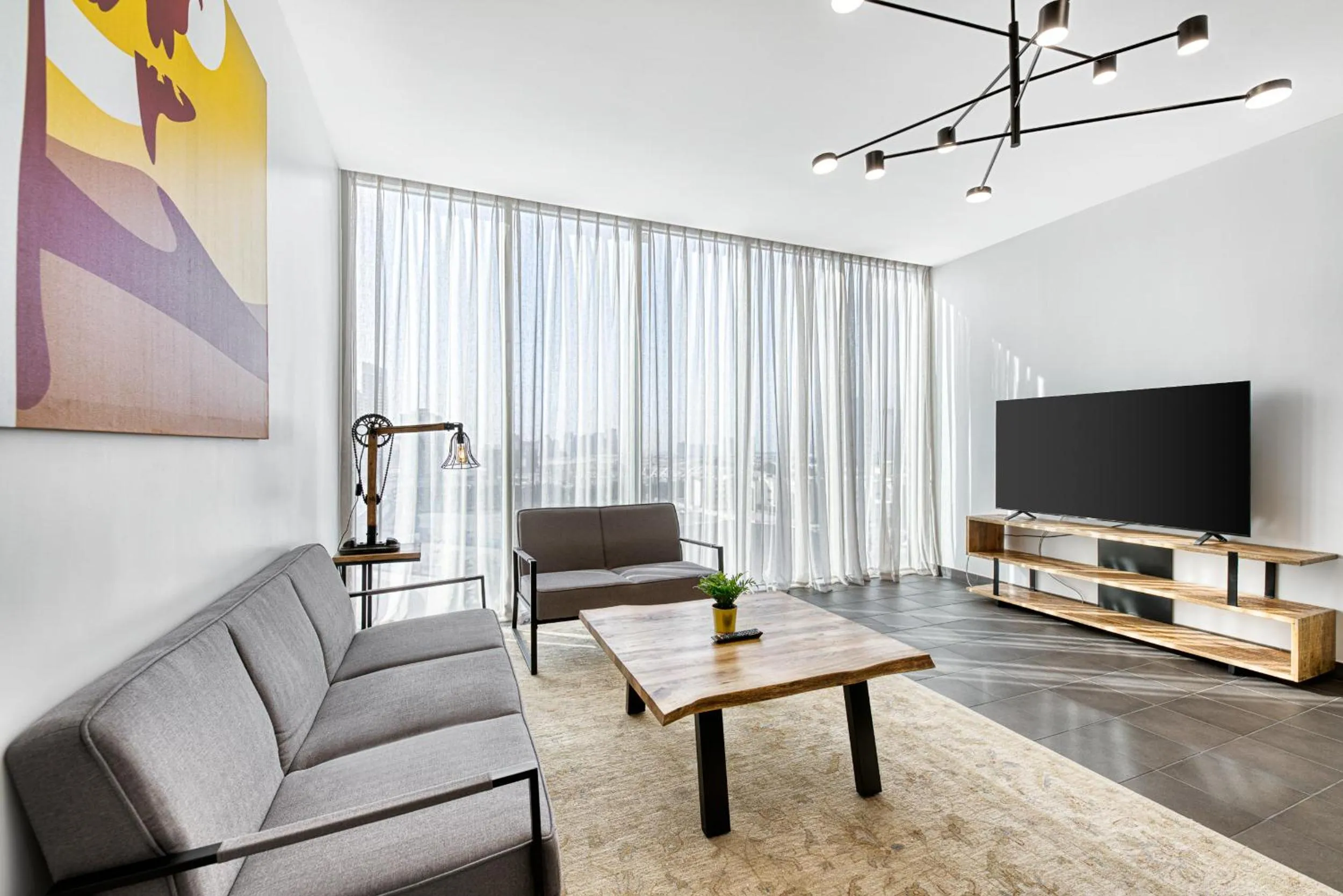 Communal lounge/ TV room in Emirates Sports Hotel, Dubai Sports City