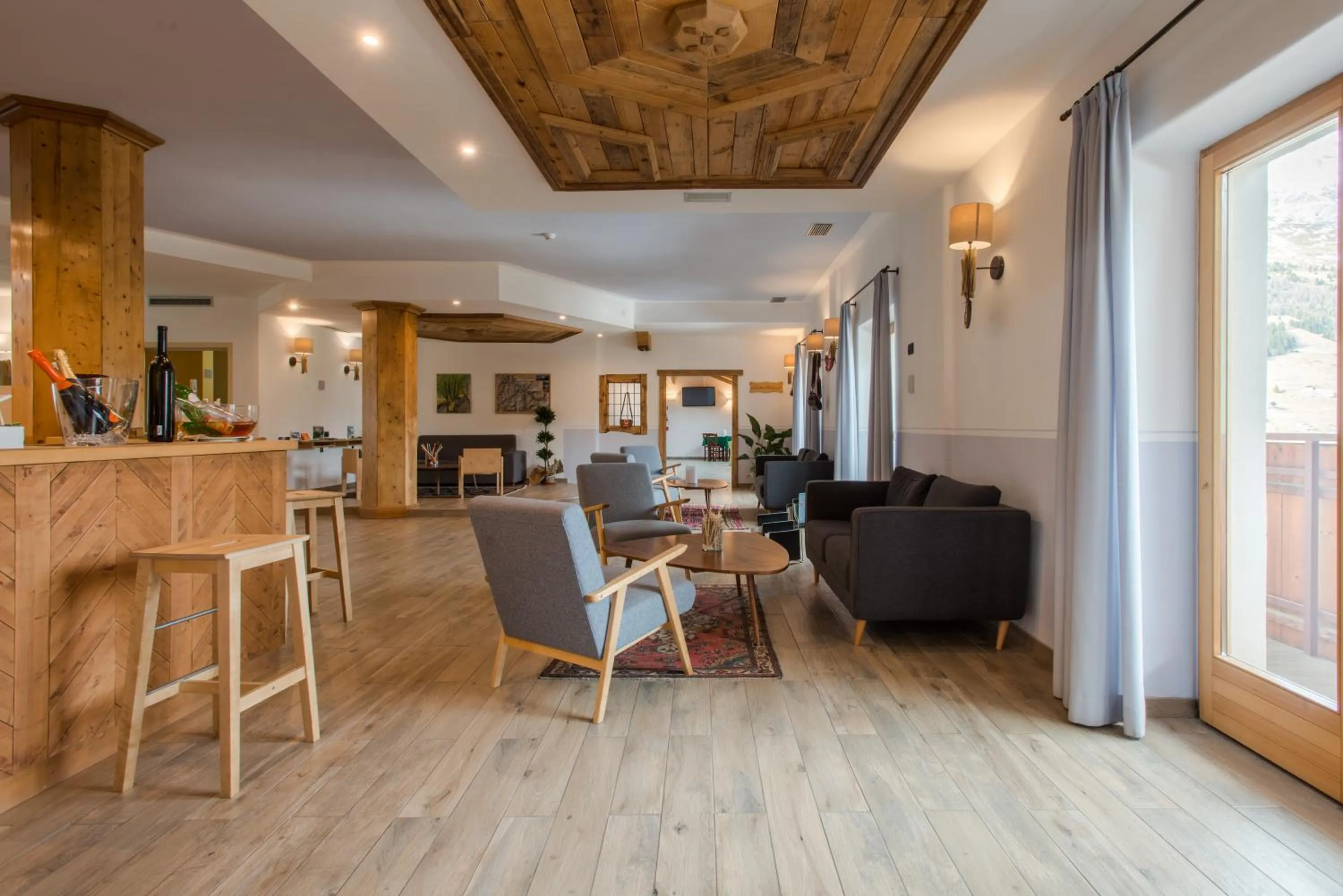 Lounge or bar in Hotel San Carlo, tra Bormio e Livigno