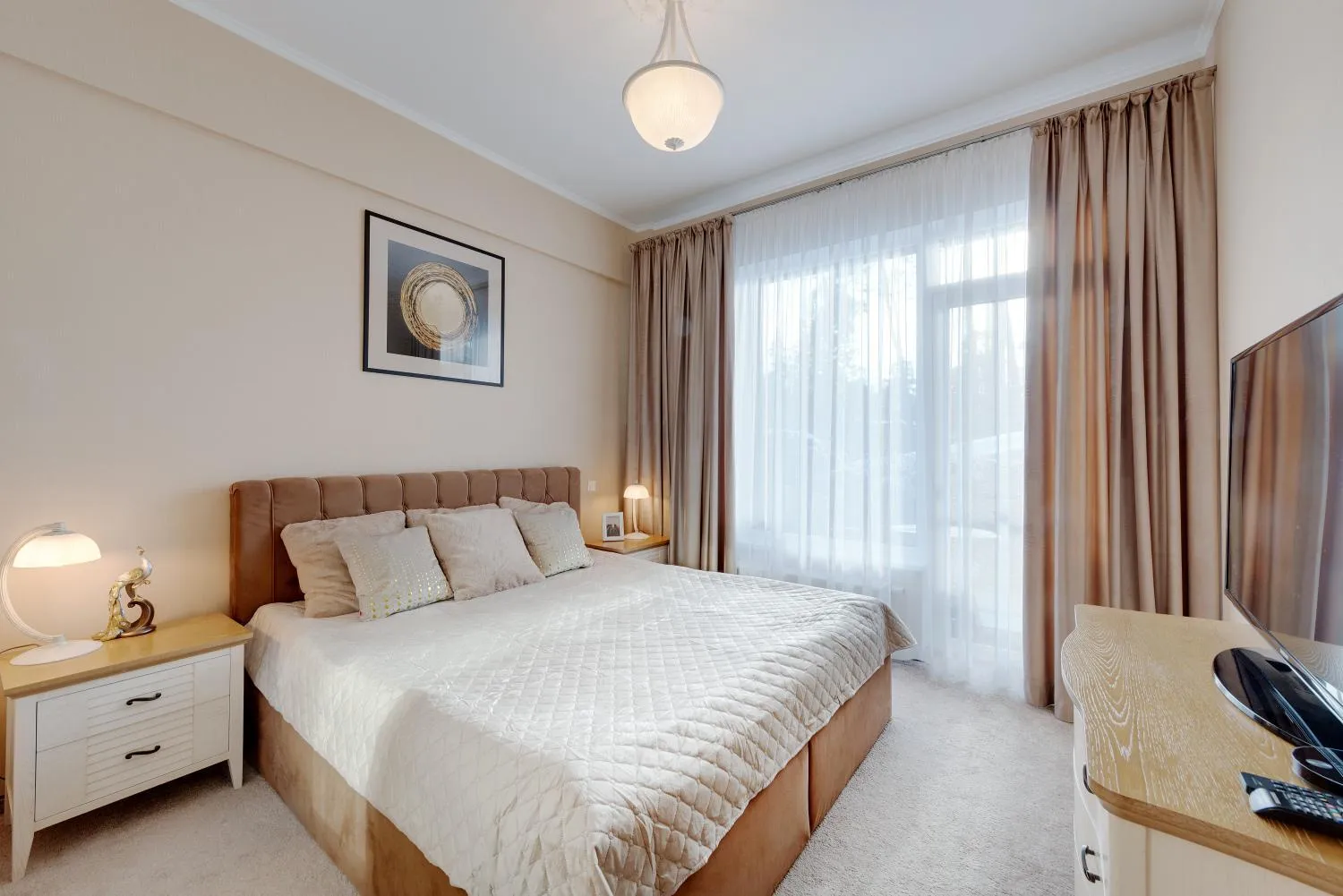 Bed in Turaidas Kvartals Four Seasons Luxury Apartment