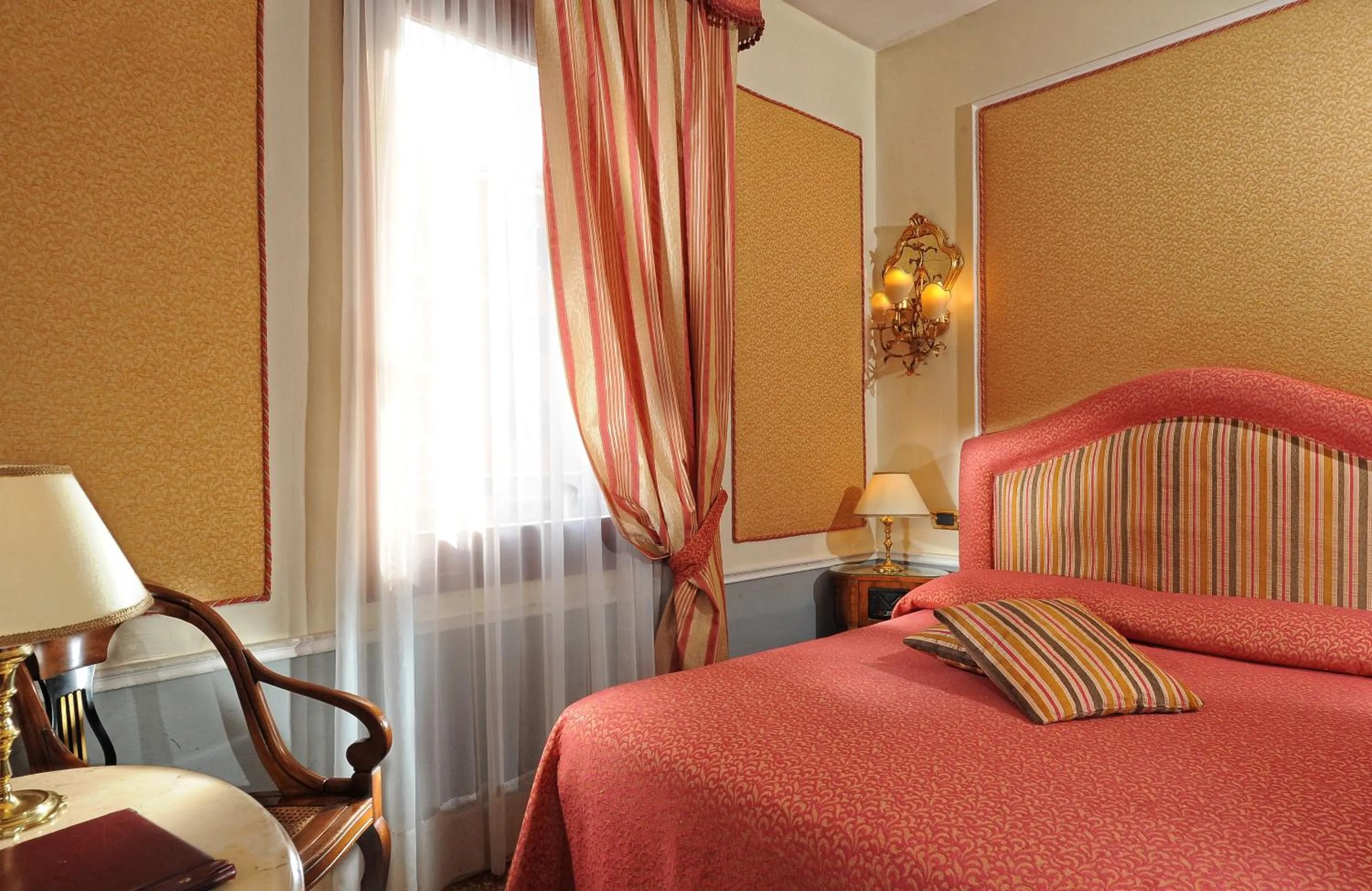 Bed in Hotel Arlecchino
