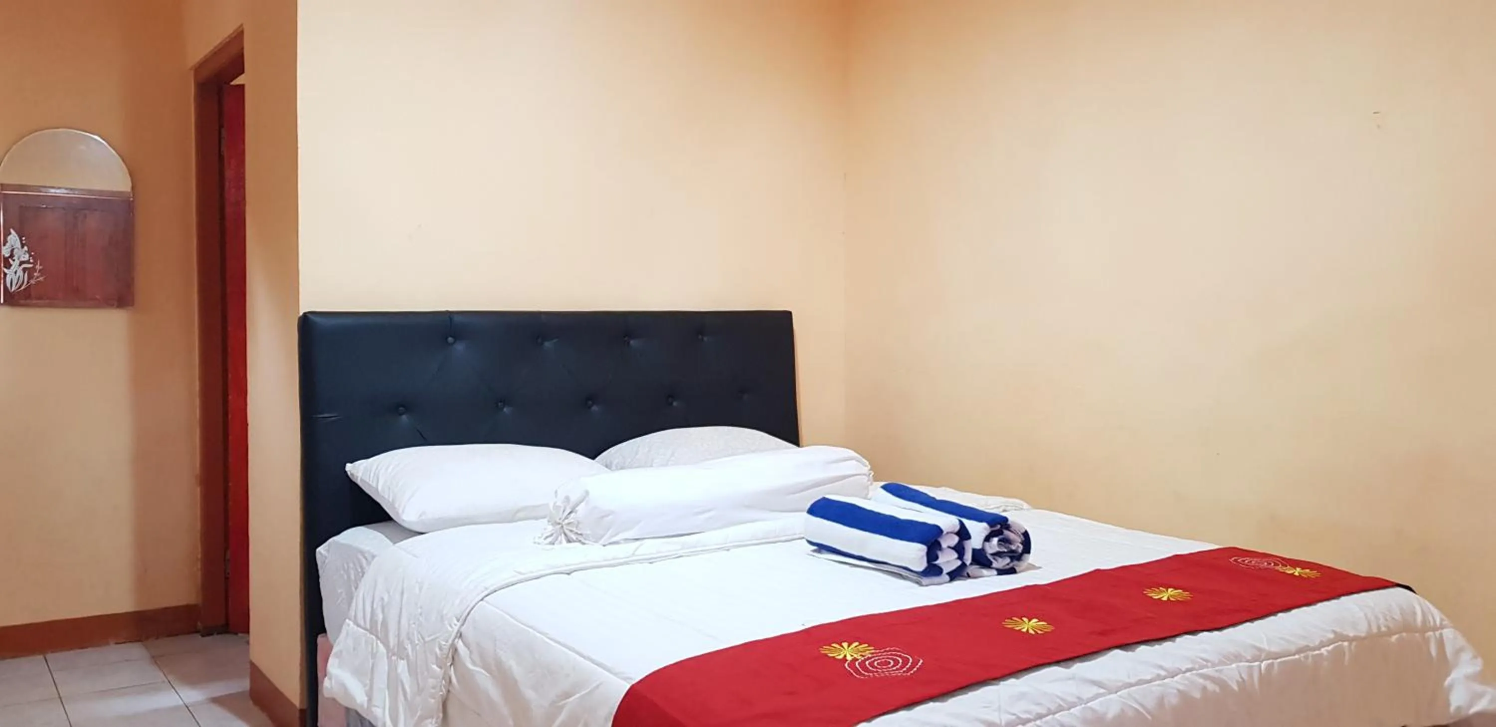 Bed in Villa Alam Flores Mbohang Ruteng Mitra RedDoorz