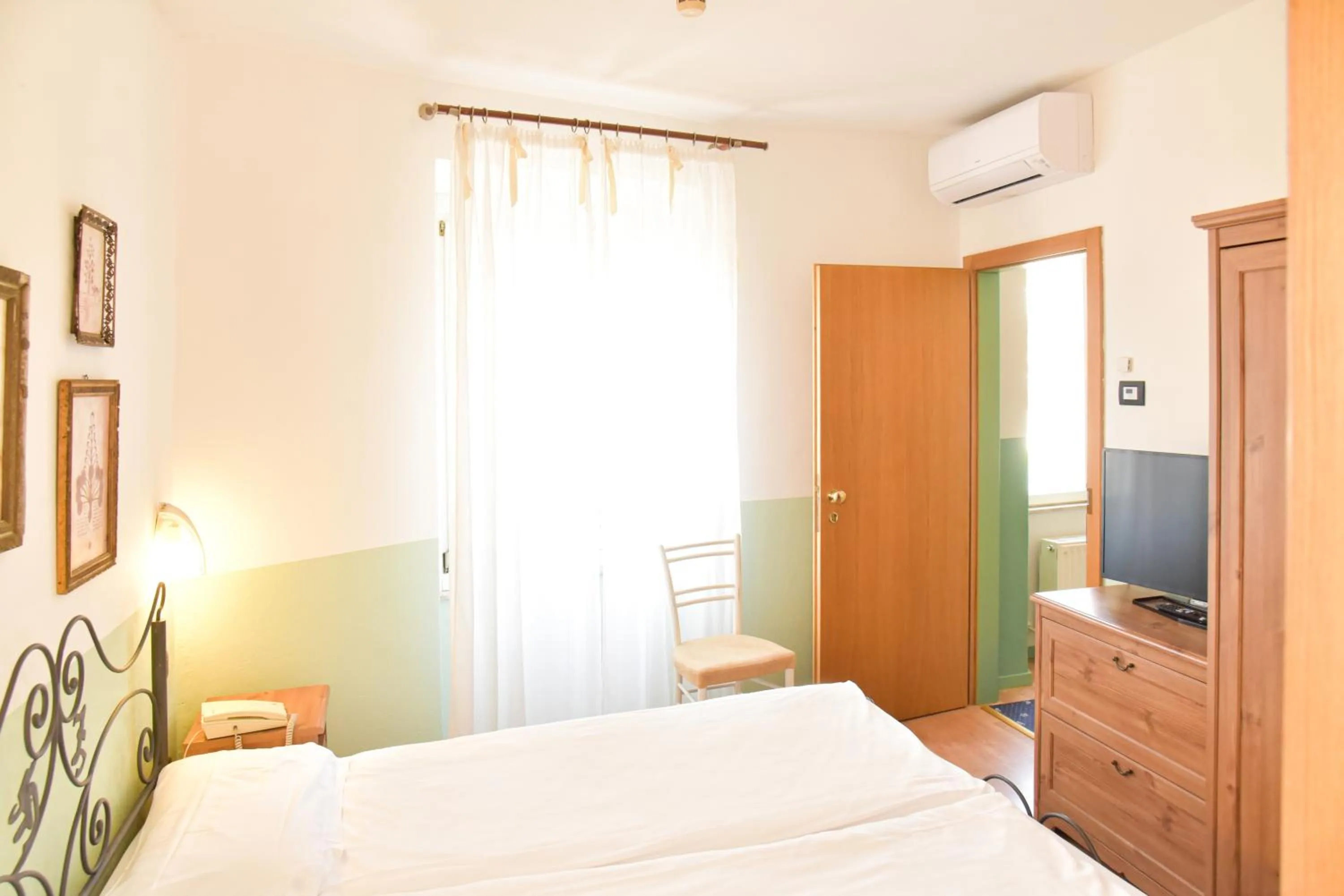 Bed in epOche Hotel Zanella 1889