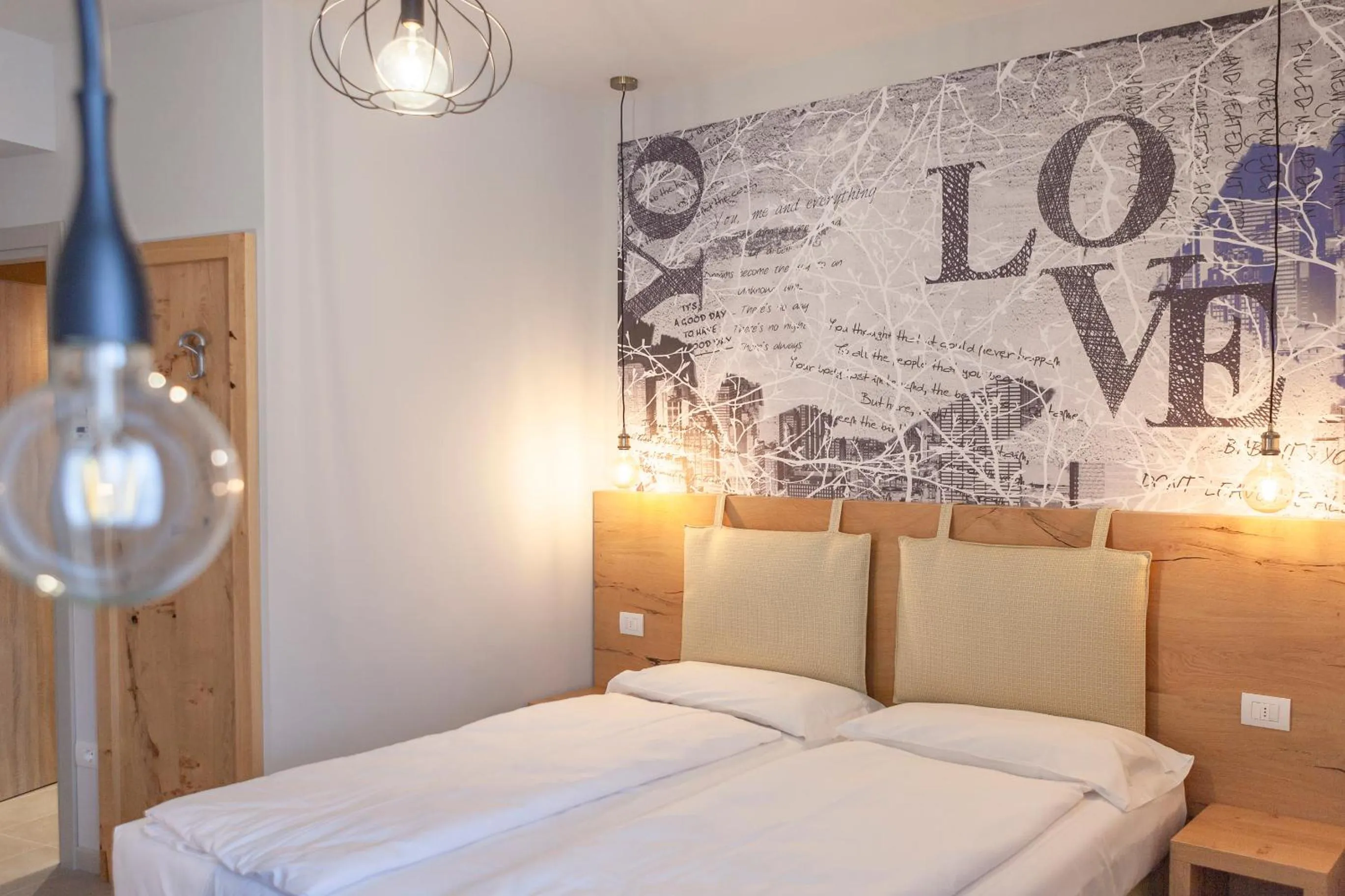 Bed in epOche Hotel Zanella 1889