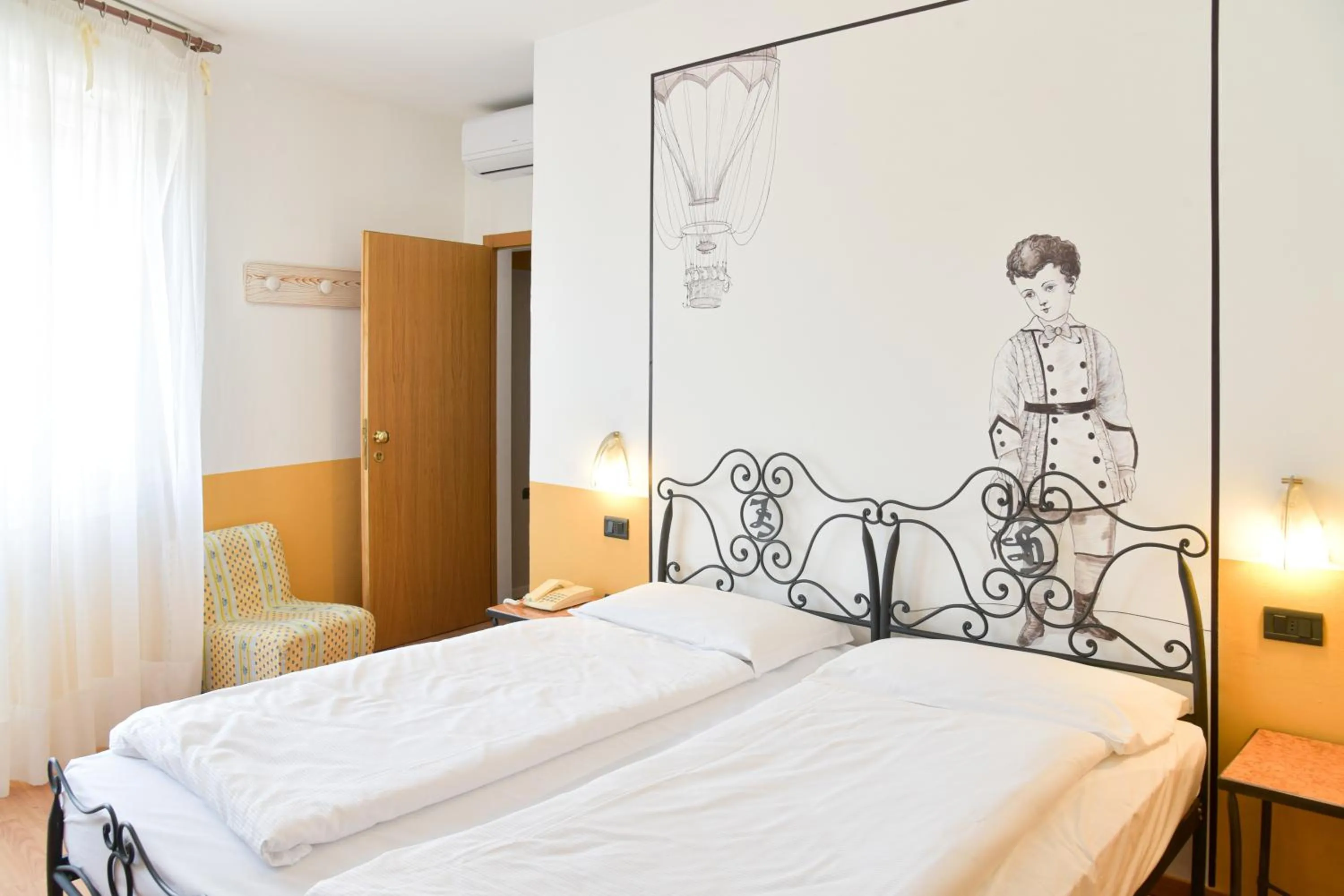 Bed in epOche Hotel Zanella 1889