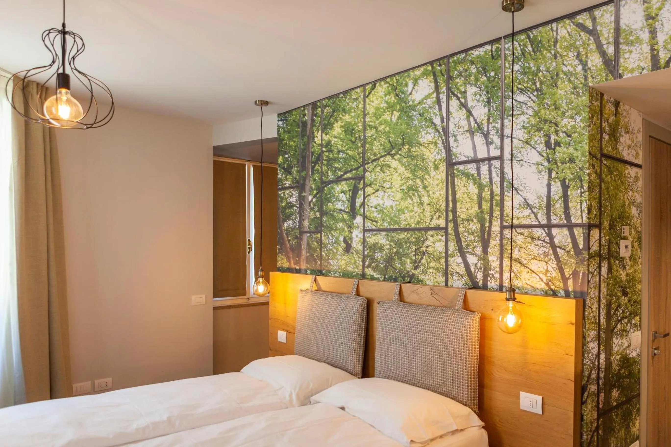 Bed in epOche Hotel Zanella 1889