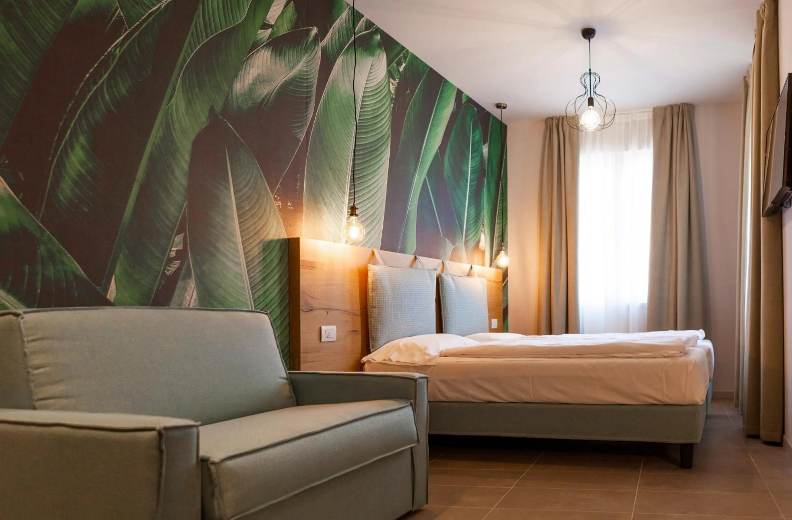 Photo of the whole room, Bed in epOche Hotel Zanella 1889