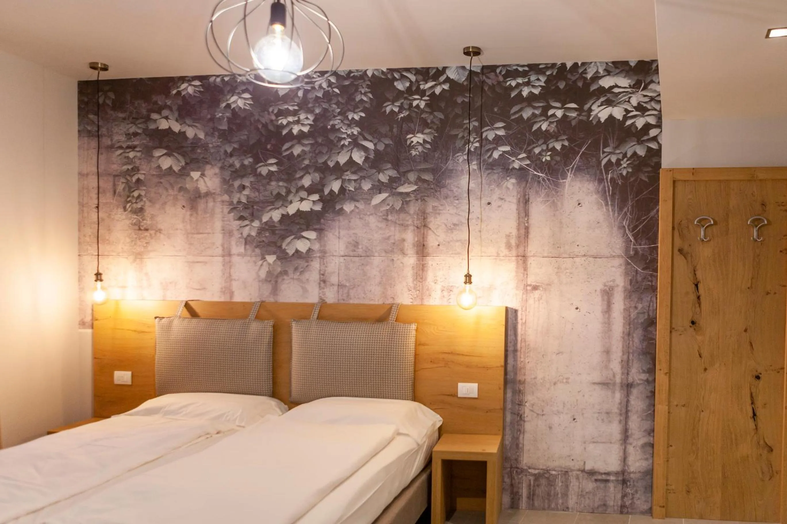 Bed in epOche Hotel Zanella 1889