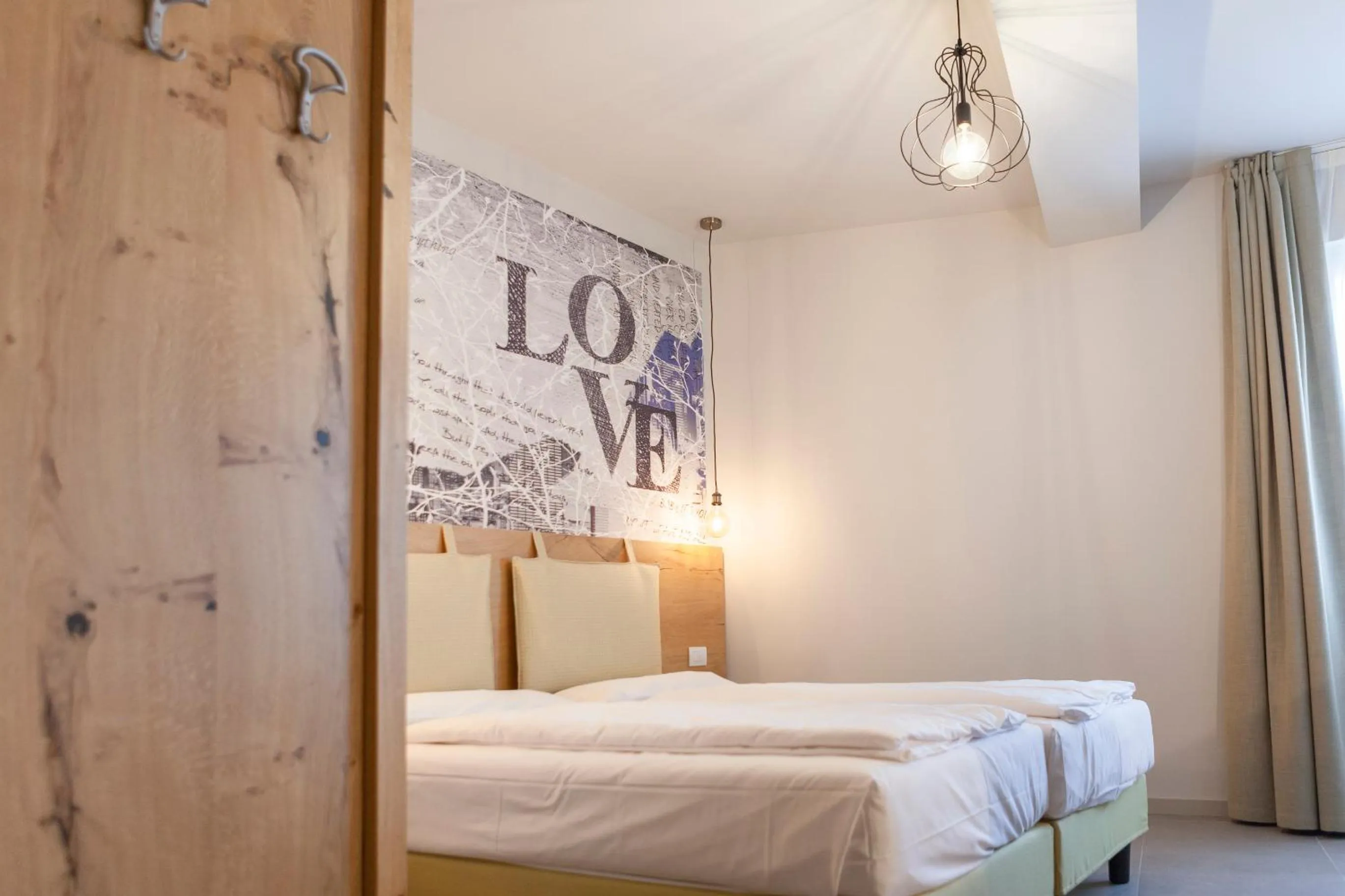 Bed in epOche Hotel Zanella 1889