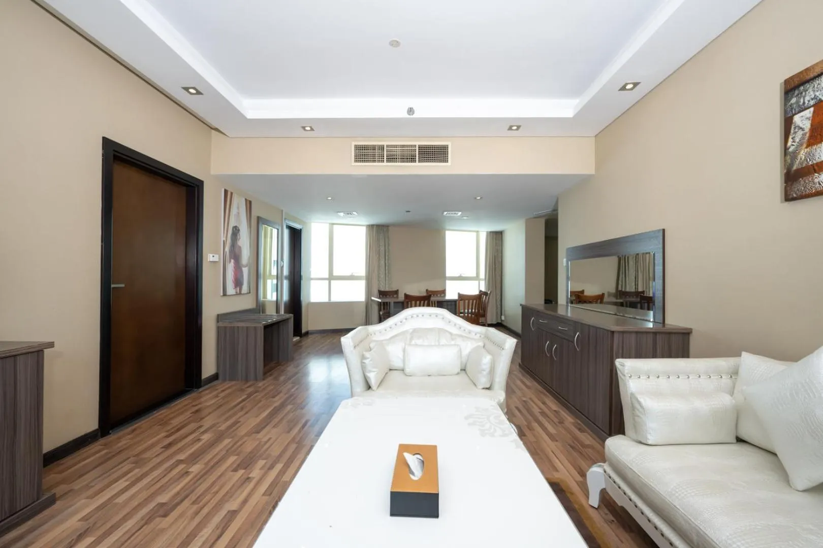 Living room, Bed in Pearl Swiss Hotel