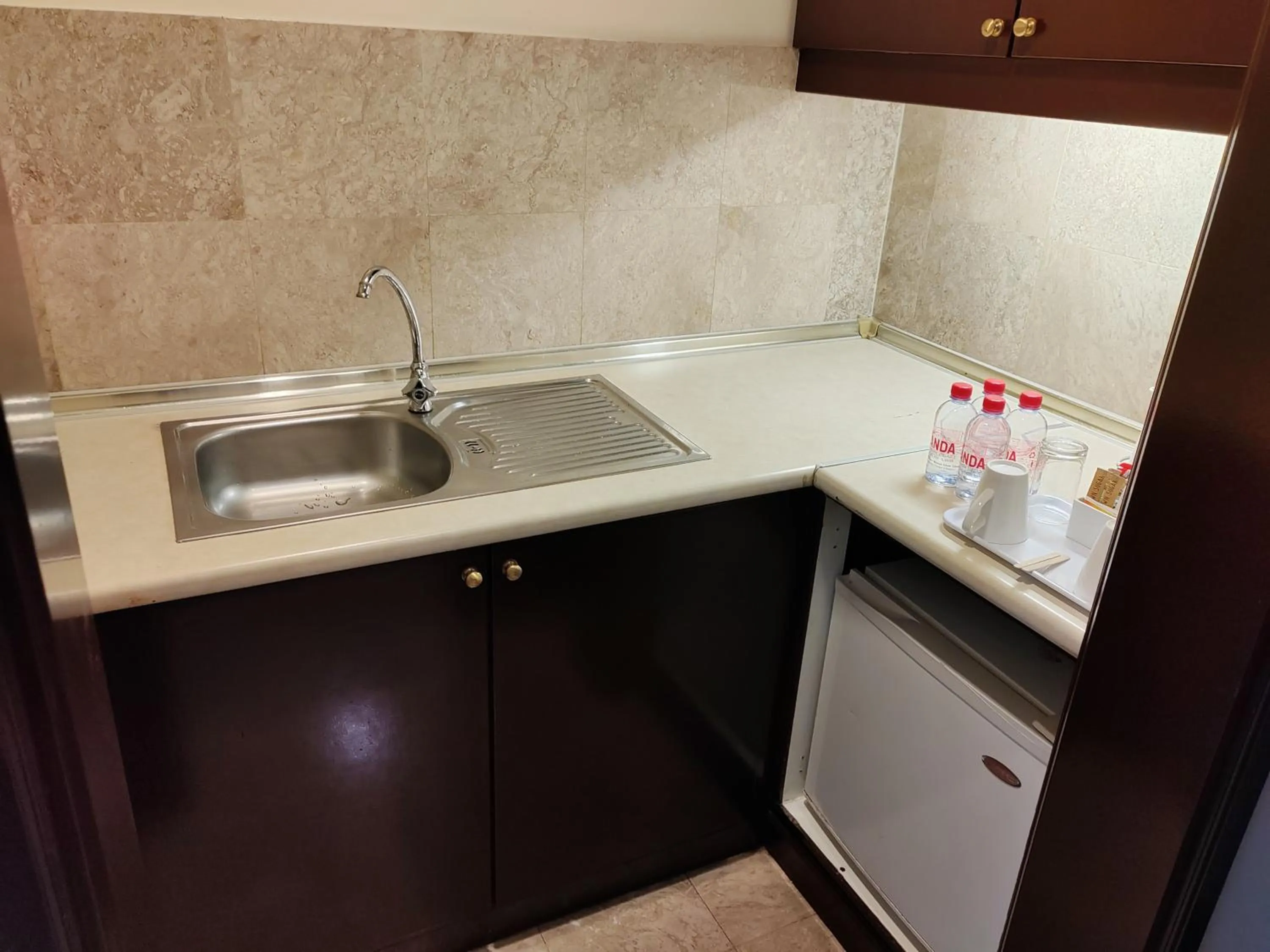 Kitchen or kitchenette in Kl landmark apartment at berjay Times square