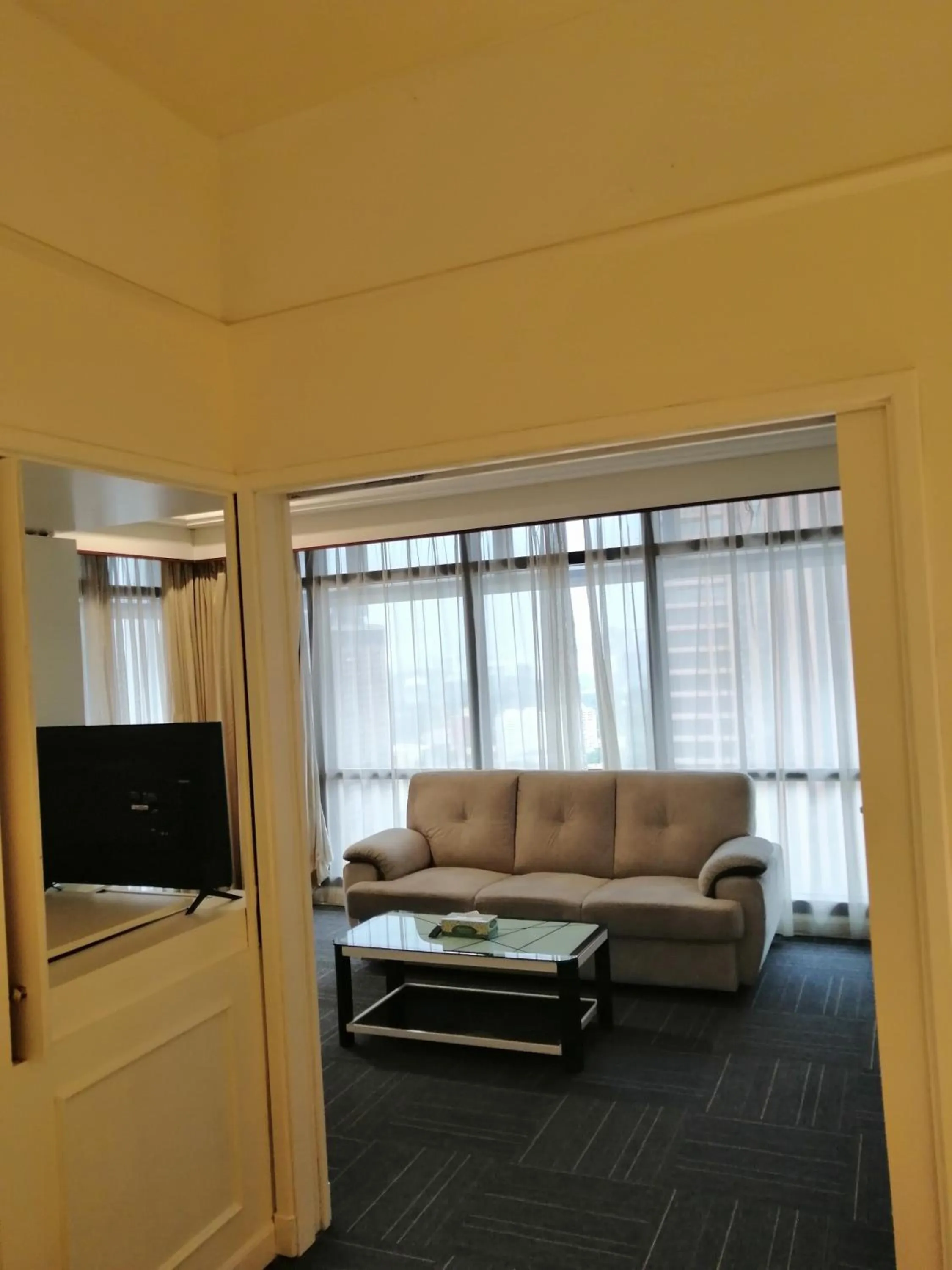 Living room in Kl landmark apartment at berjay Times square