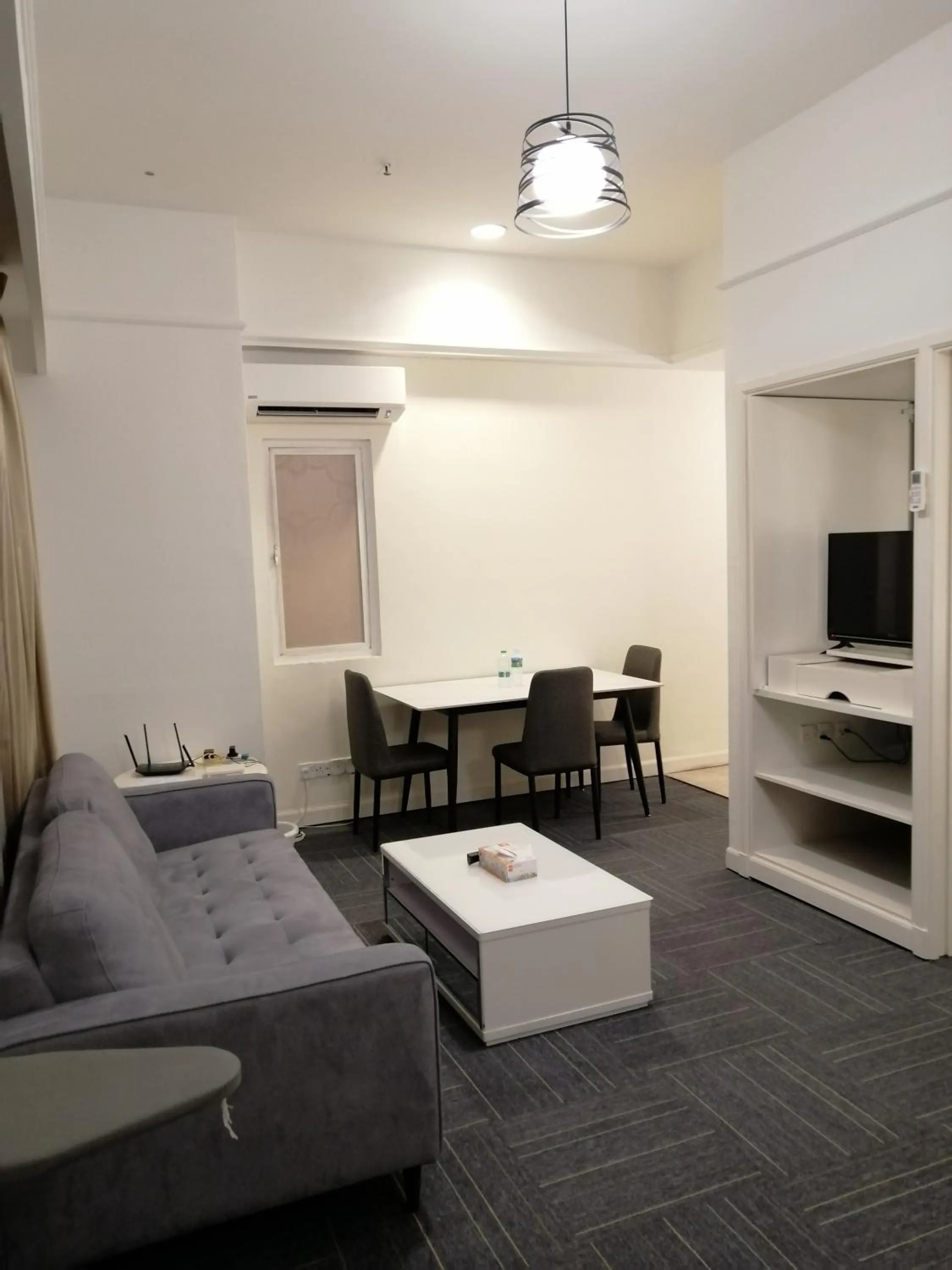 Living room in Kl landmark apartment at berjay Times square