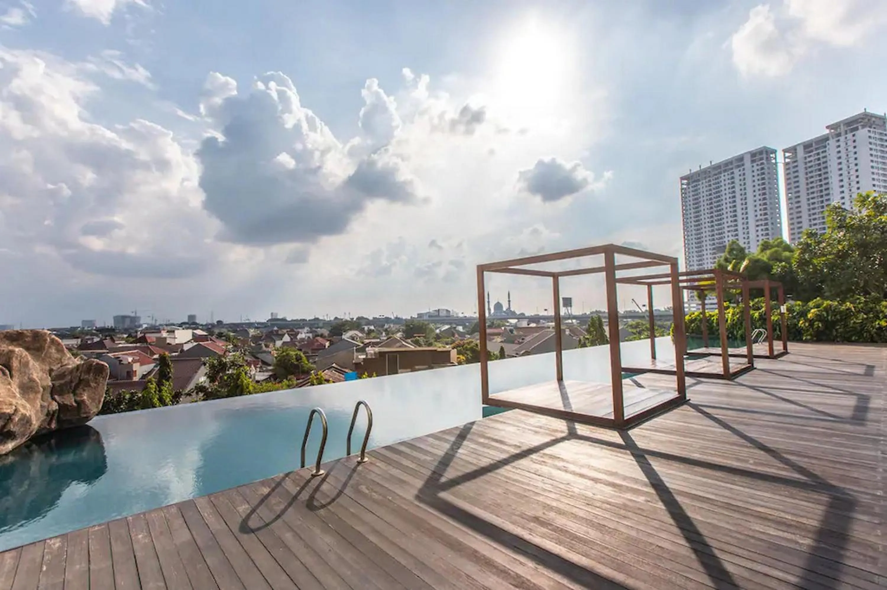 Swimming pool in RedLiving Apartemen Grand Kamala Lagoon - Pekayon Tower Barclay North