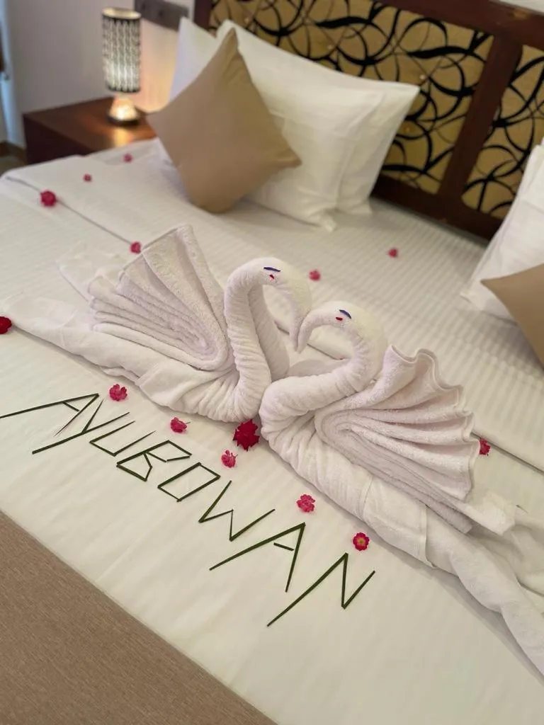 Bed in Sigiriya Cashew Palace Resort