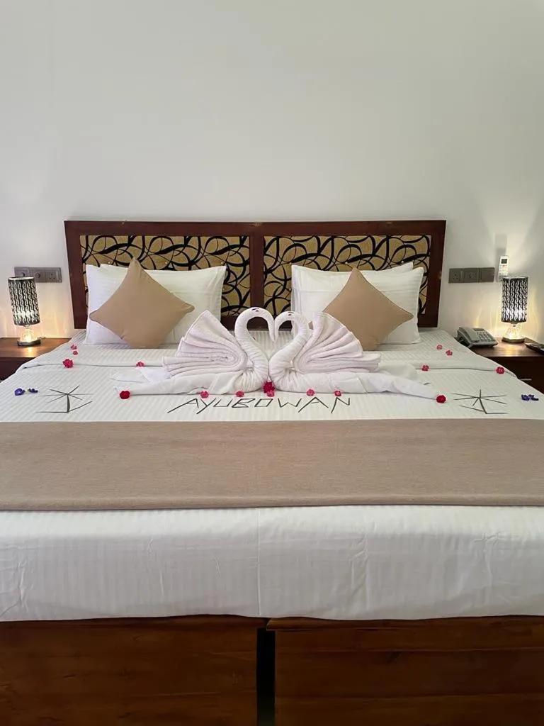 Bed in Sigiriya Cashew Palace Resort