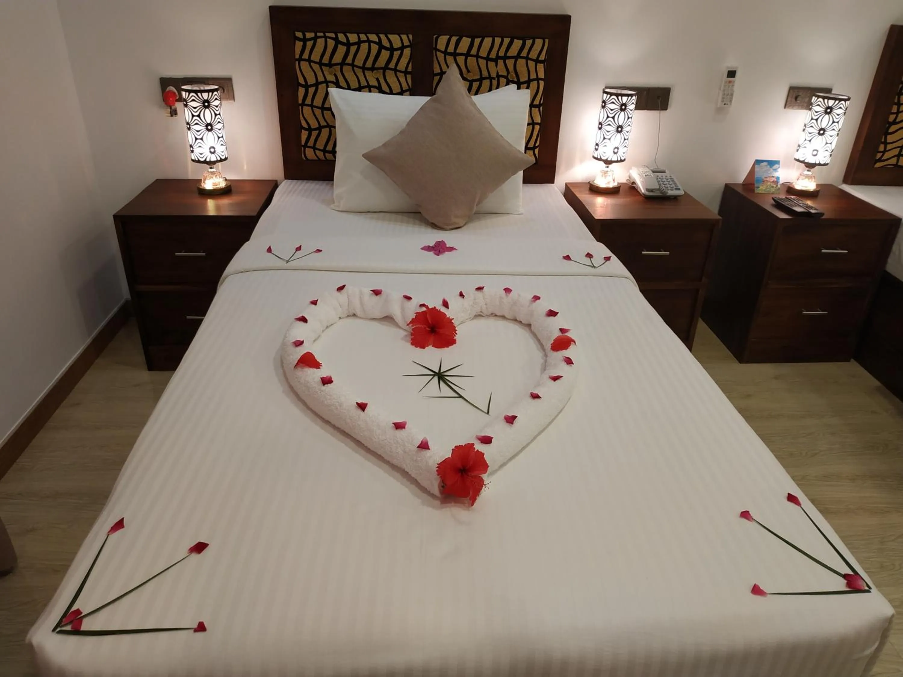 Bed in Sigiriya Cashew Palace Resort