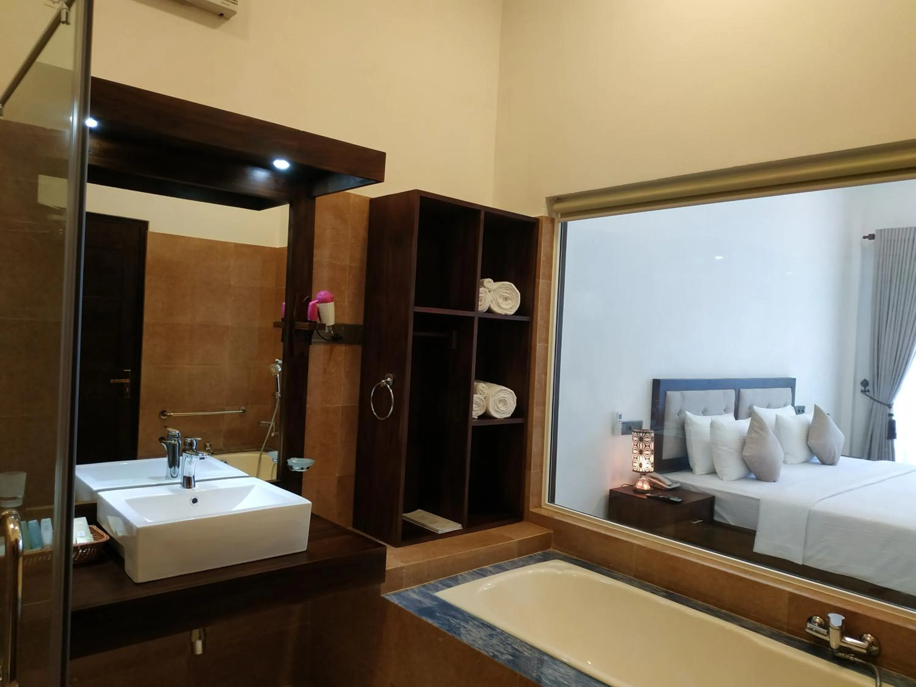 Bed in Sigiriya Cashew Palace Resort