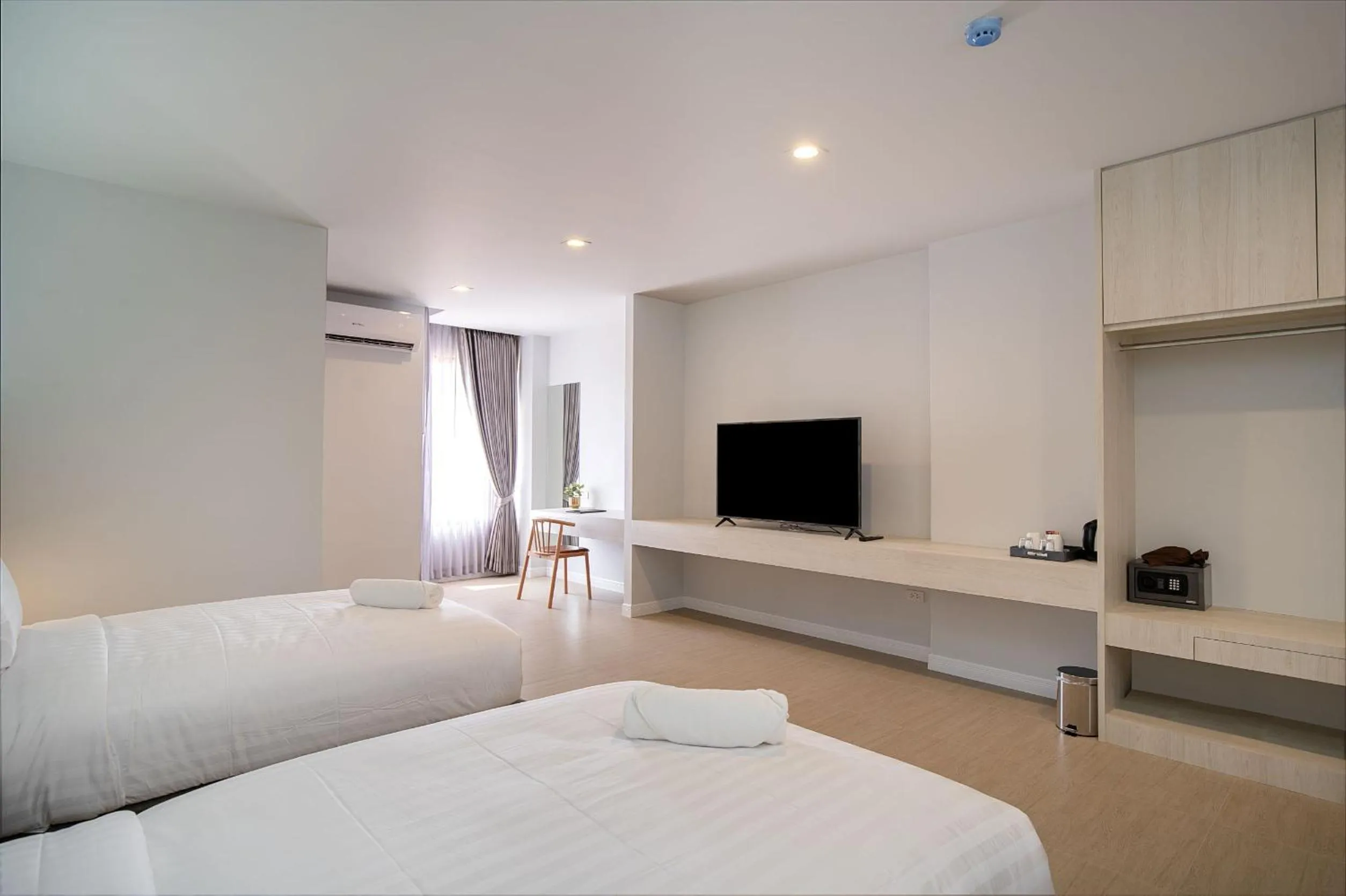 Bed in The Pride Hotel Phitsanulok