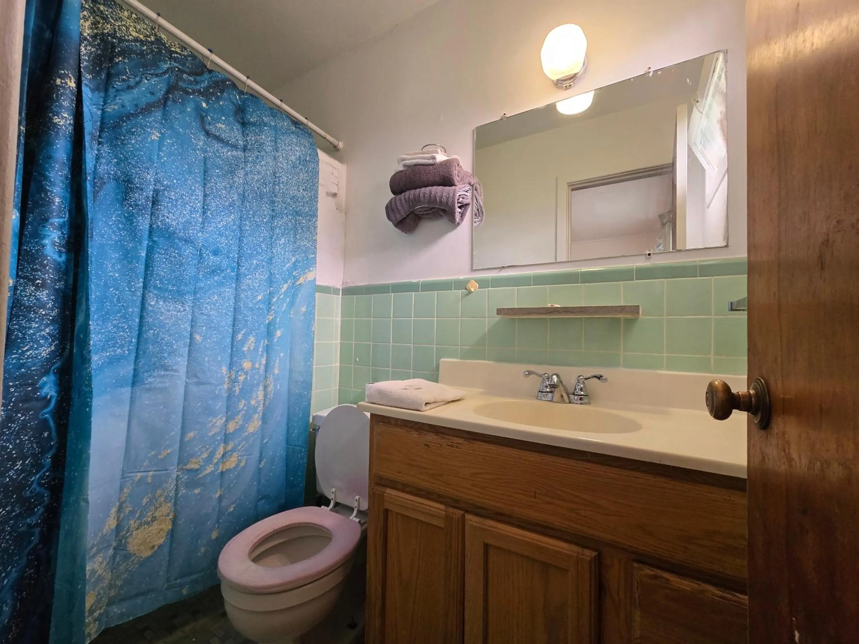 Bathroom in OYO Sandman Inn