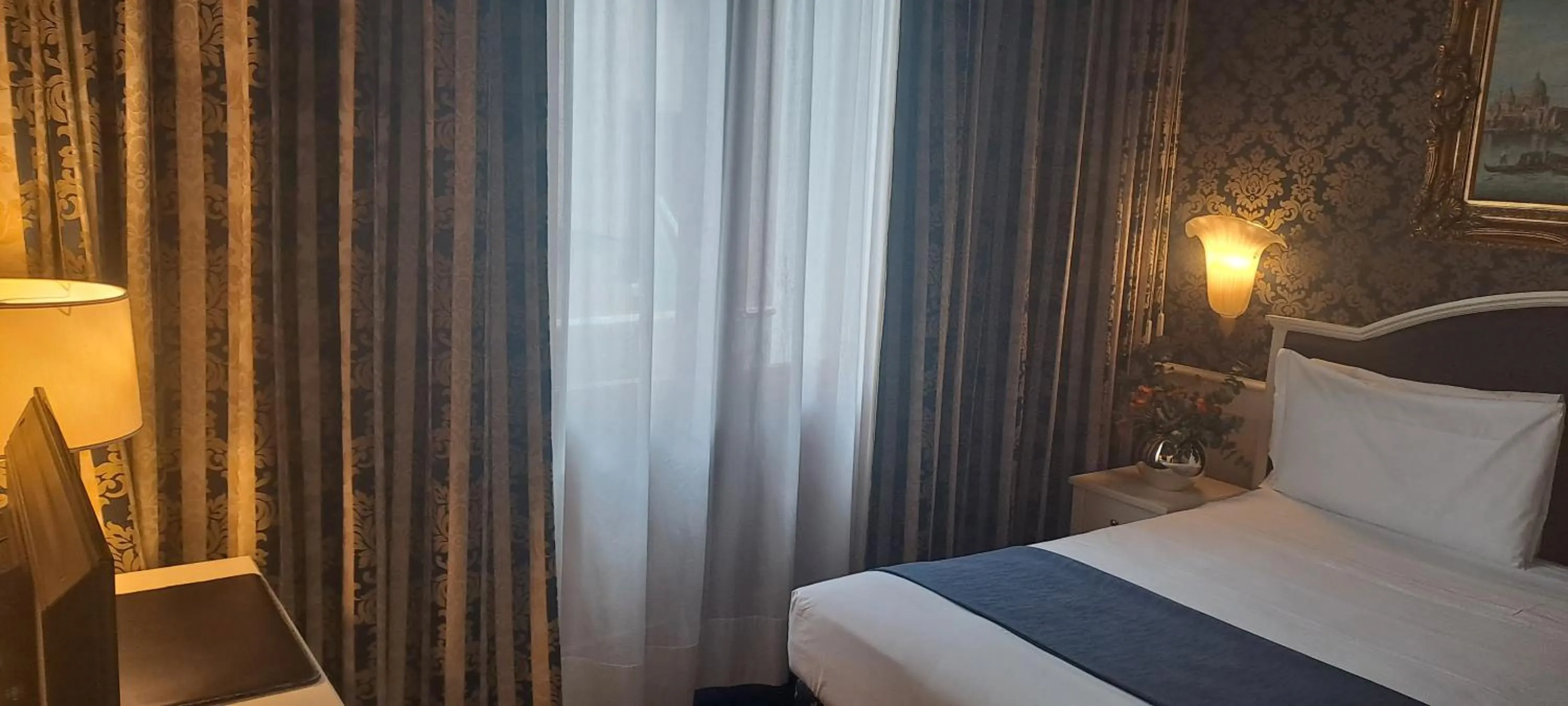 Bed in Duodo Palace Hotel