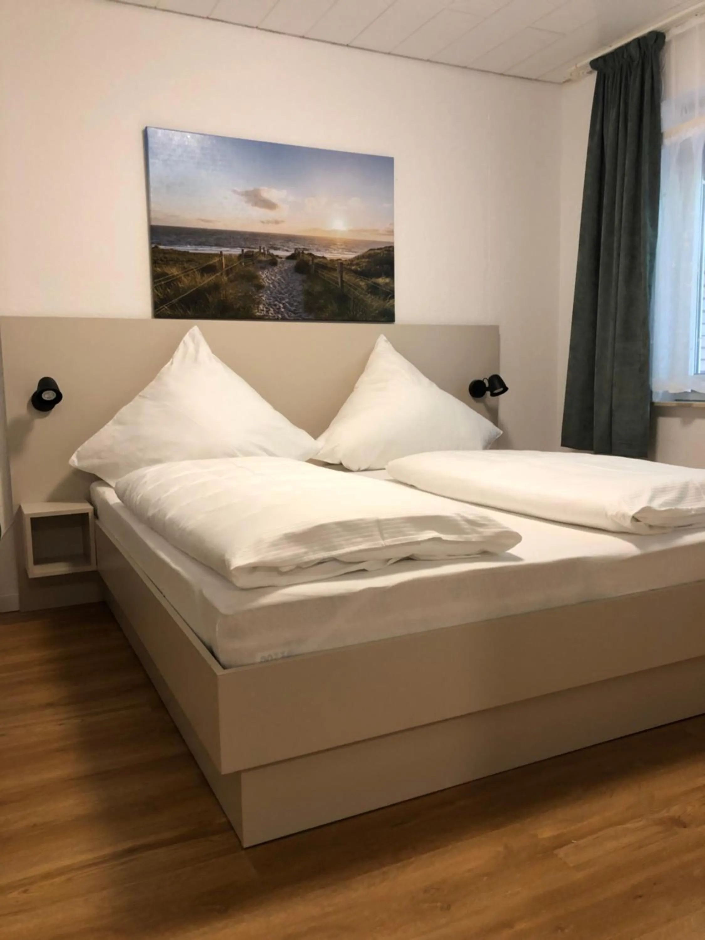 Bed in pension-seegarten