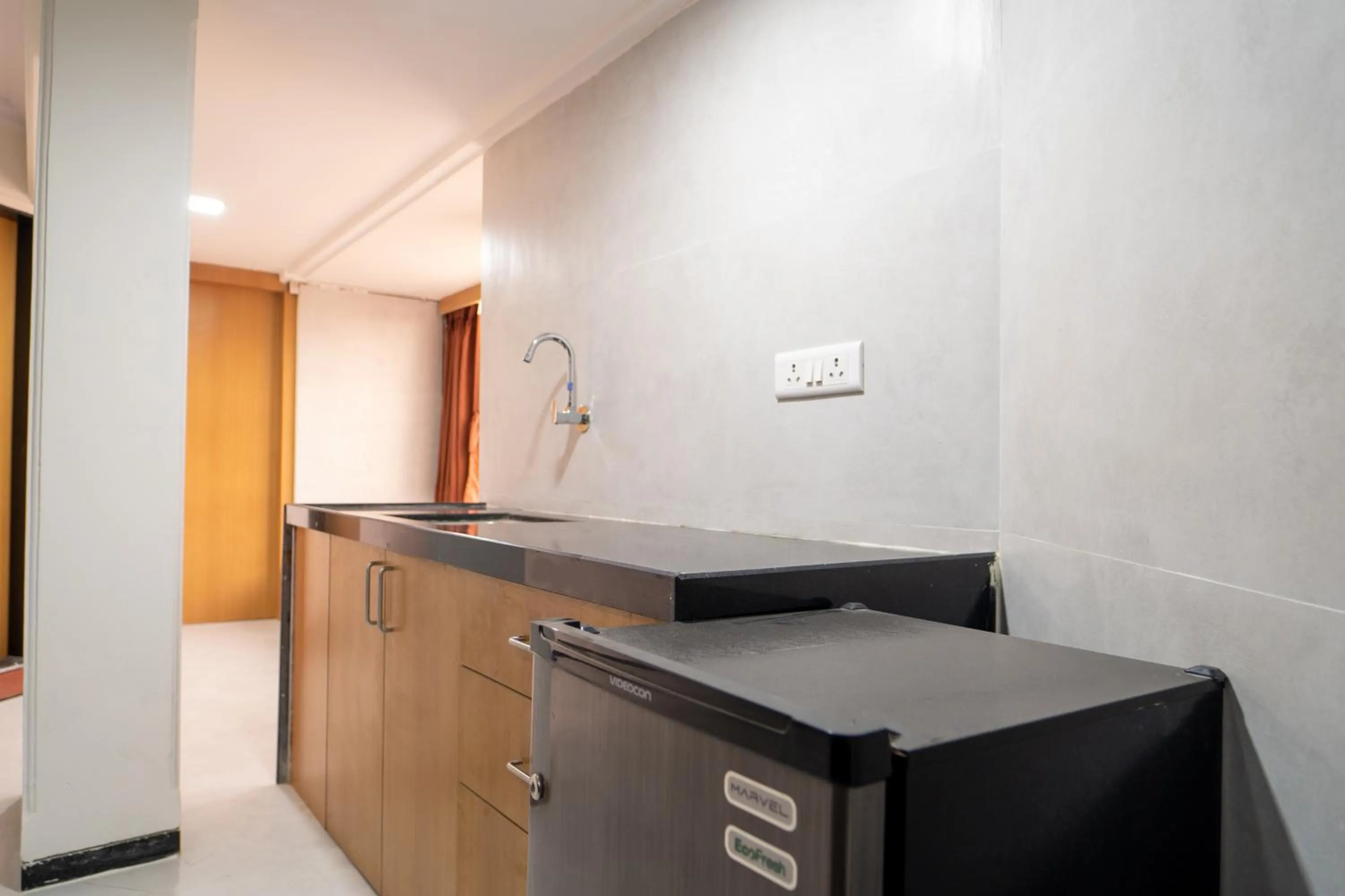 Kitchen or kitchenette in Hotel Kewal
