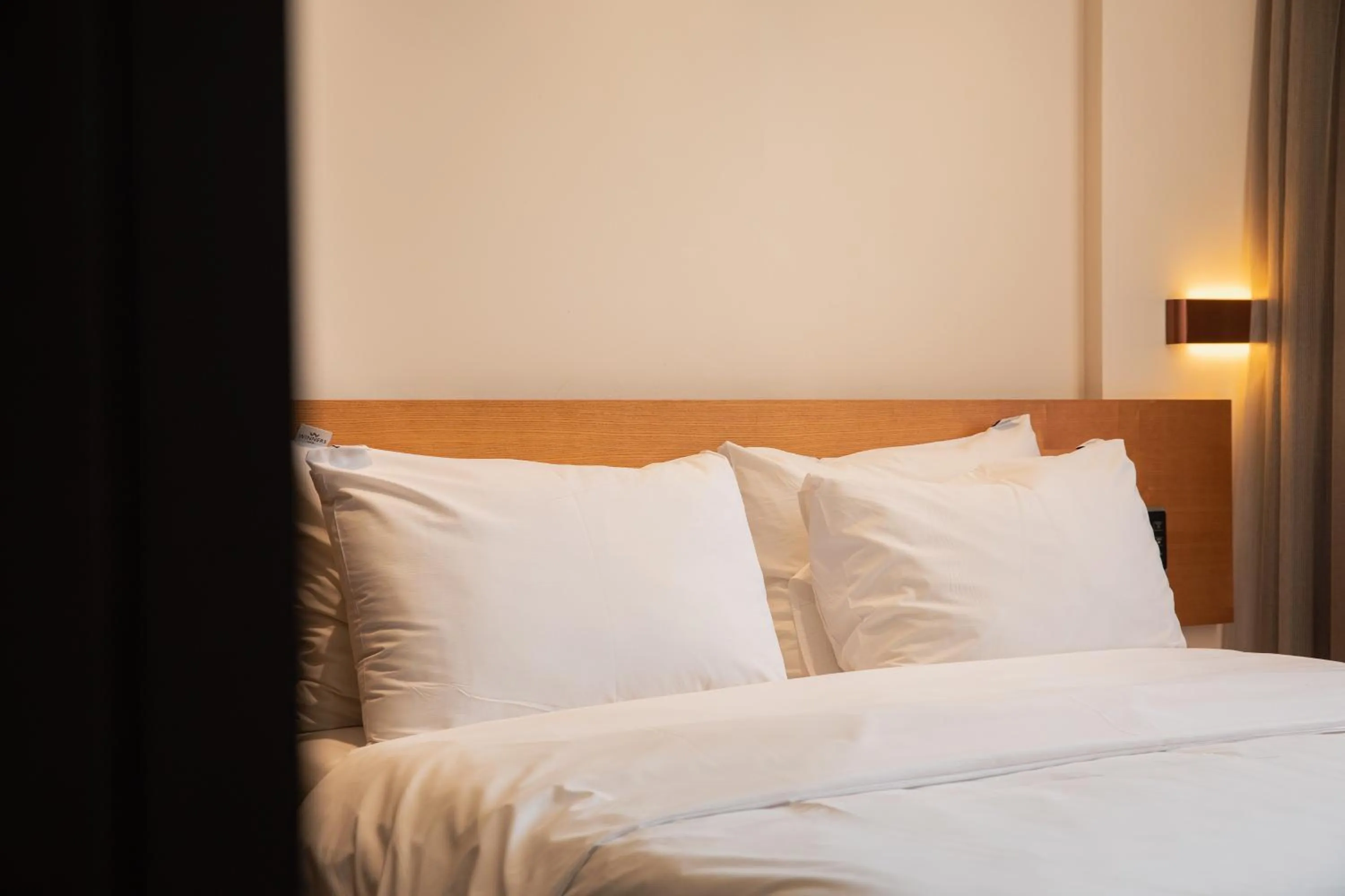 Bed in Winners Hotel