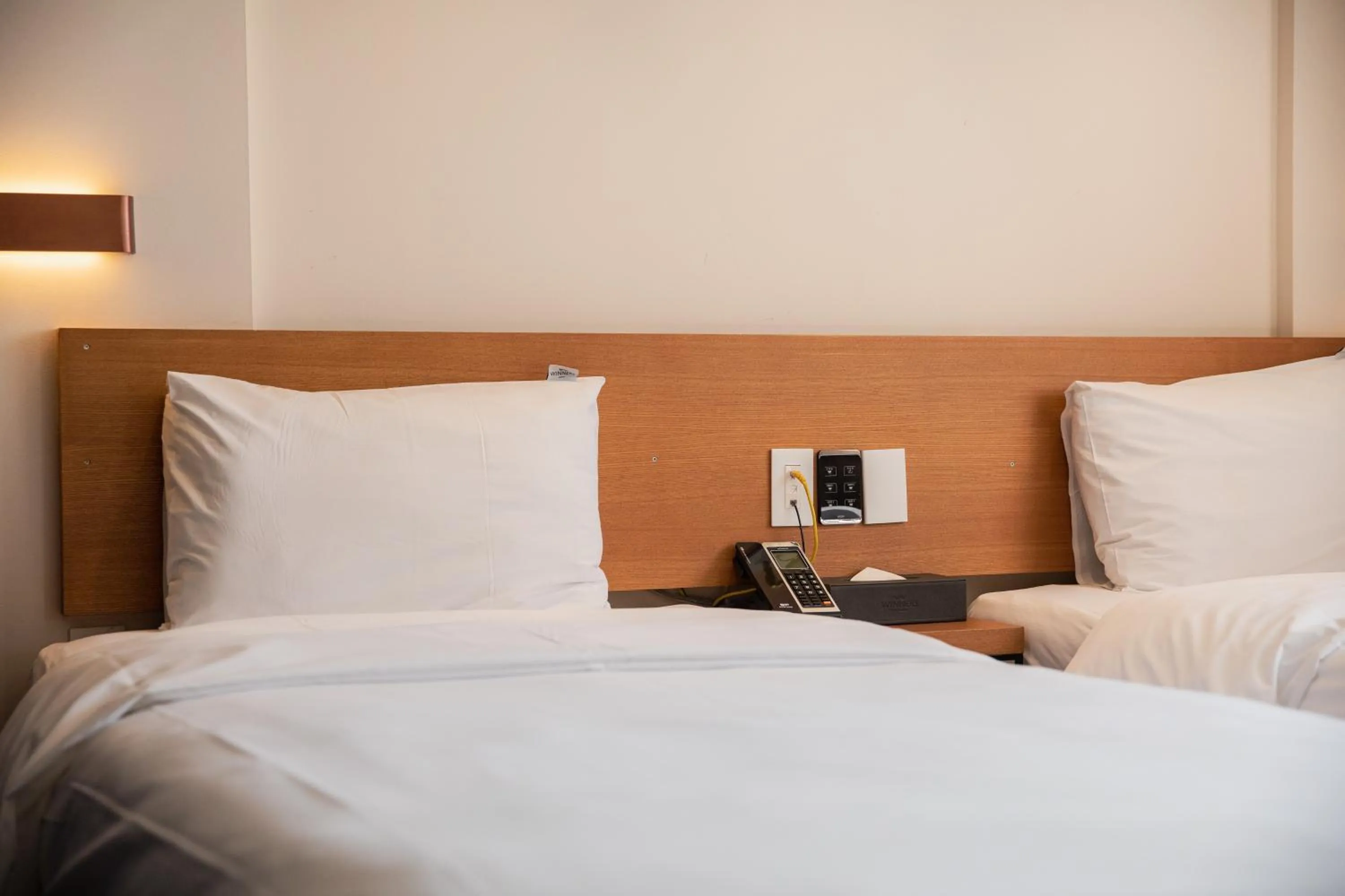 Bed in Winners Hotel