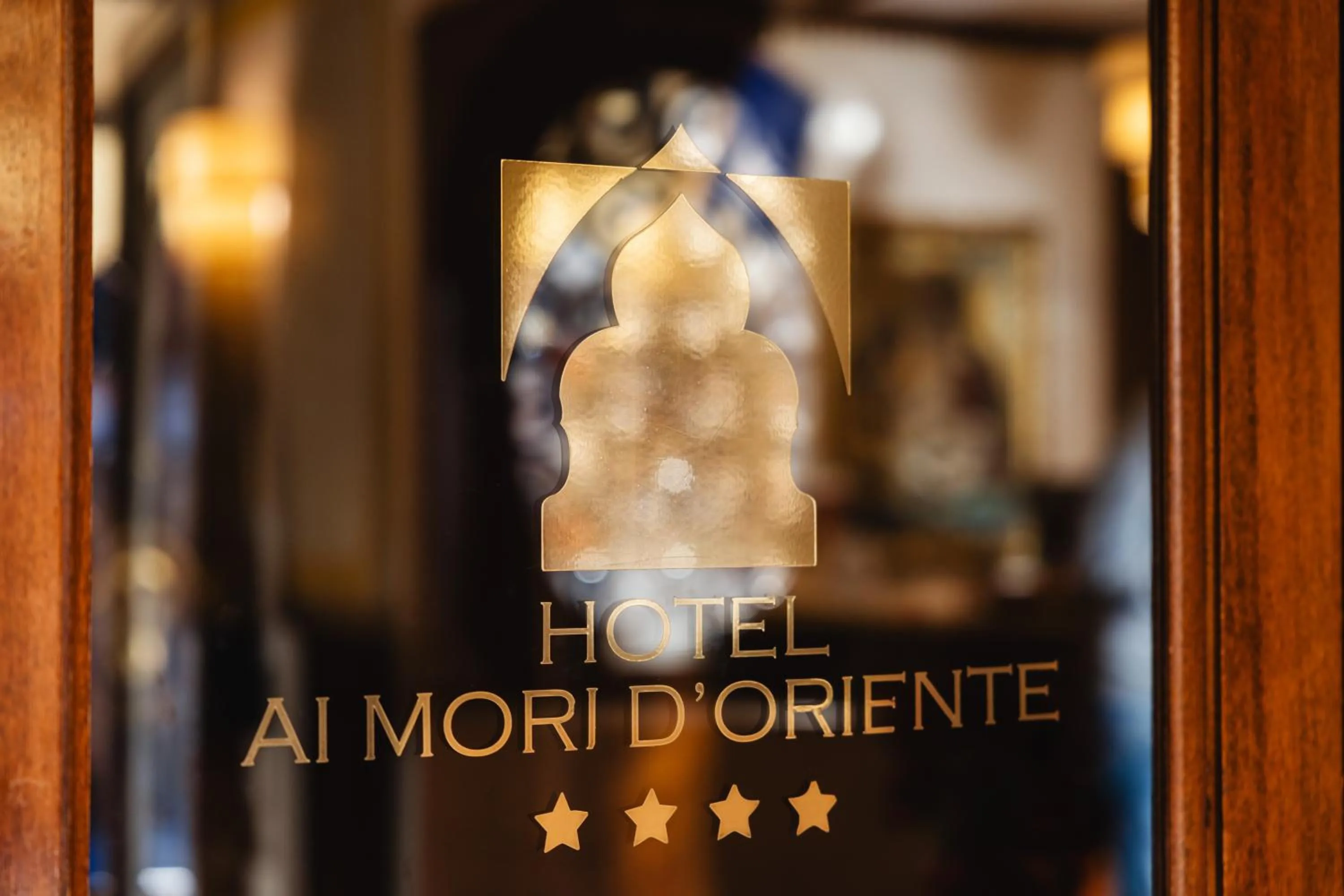 Property logo or sign in Ai Mori d'Oriente