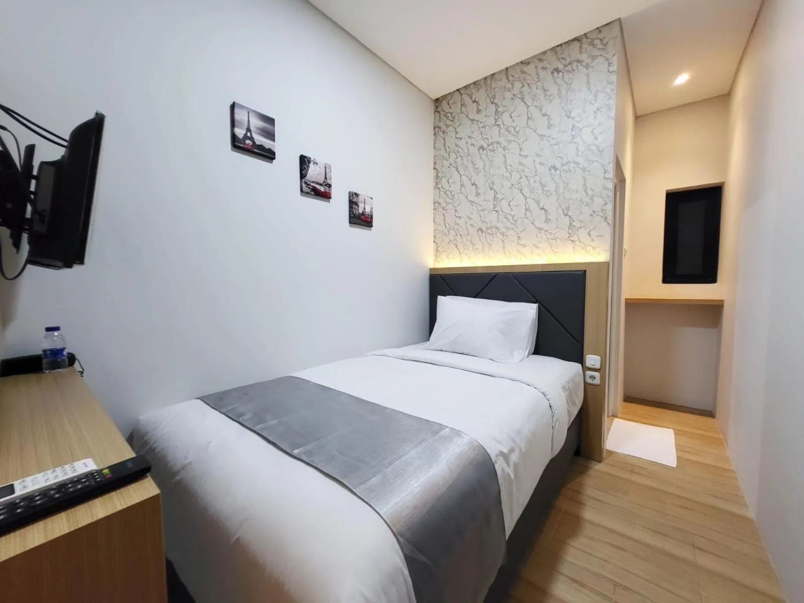 Bedroom in Grand Plaza Boutique Hotel