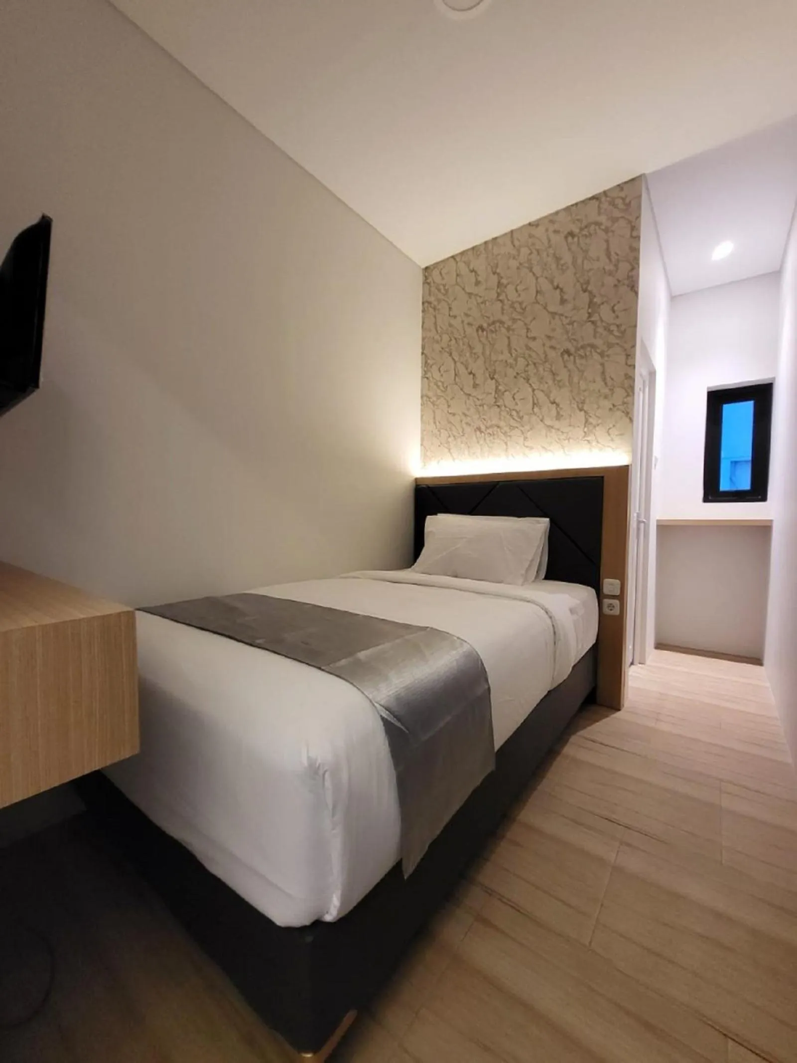 Bedroom in Grand Plaza Boutique Hotel