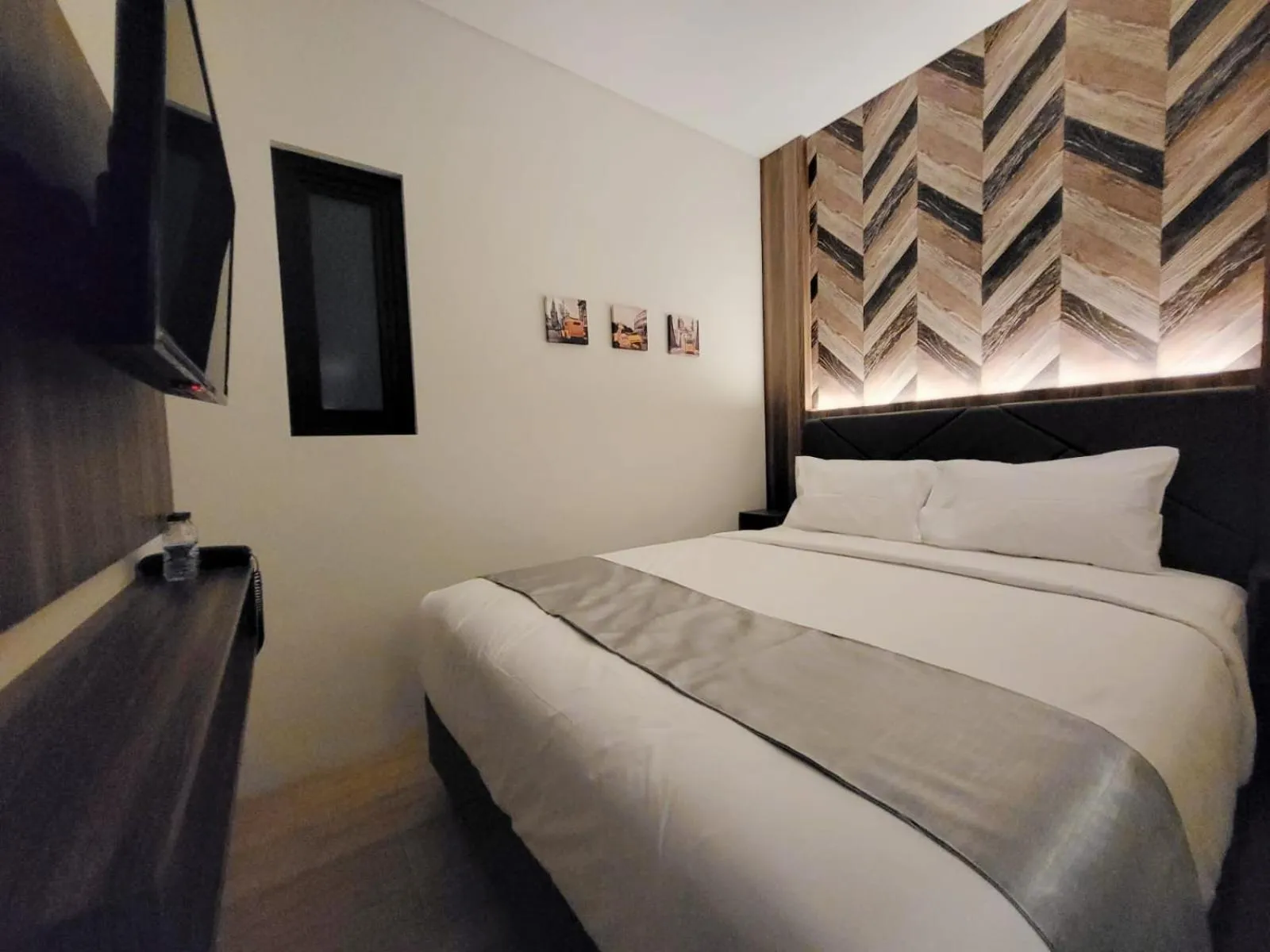 Bedroom in Grand Plaza Boutique Hotel