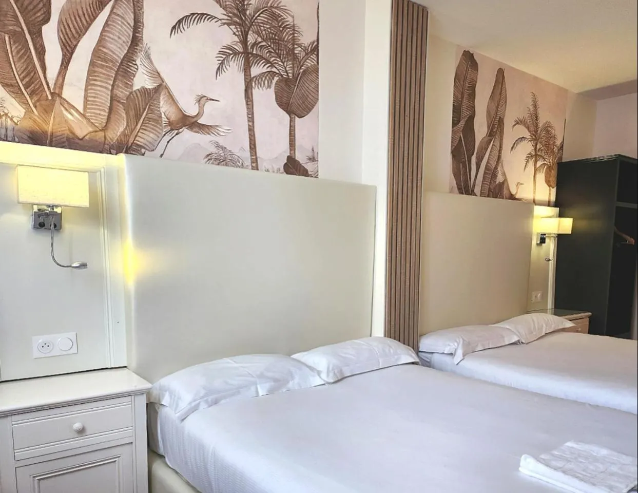 Bed in HOTEL ROYAL Paris Ivry