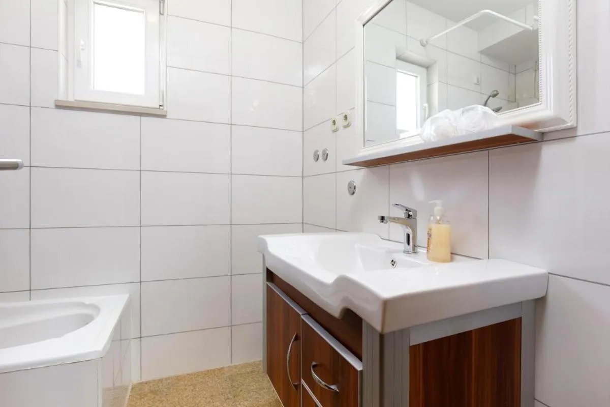 Bathroom in Nice apartment with a sea view
