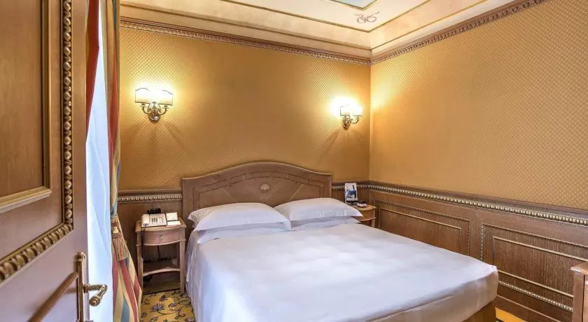 Bed in River Palace Hotel