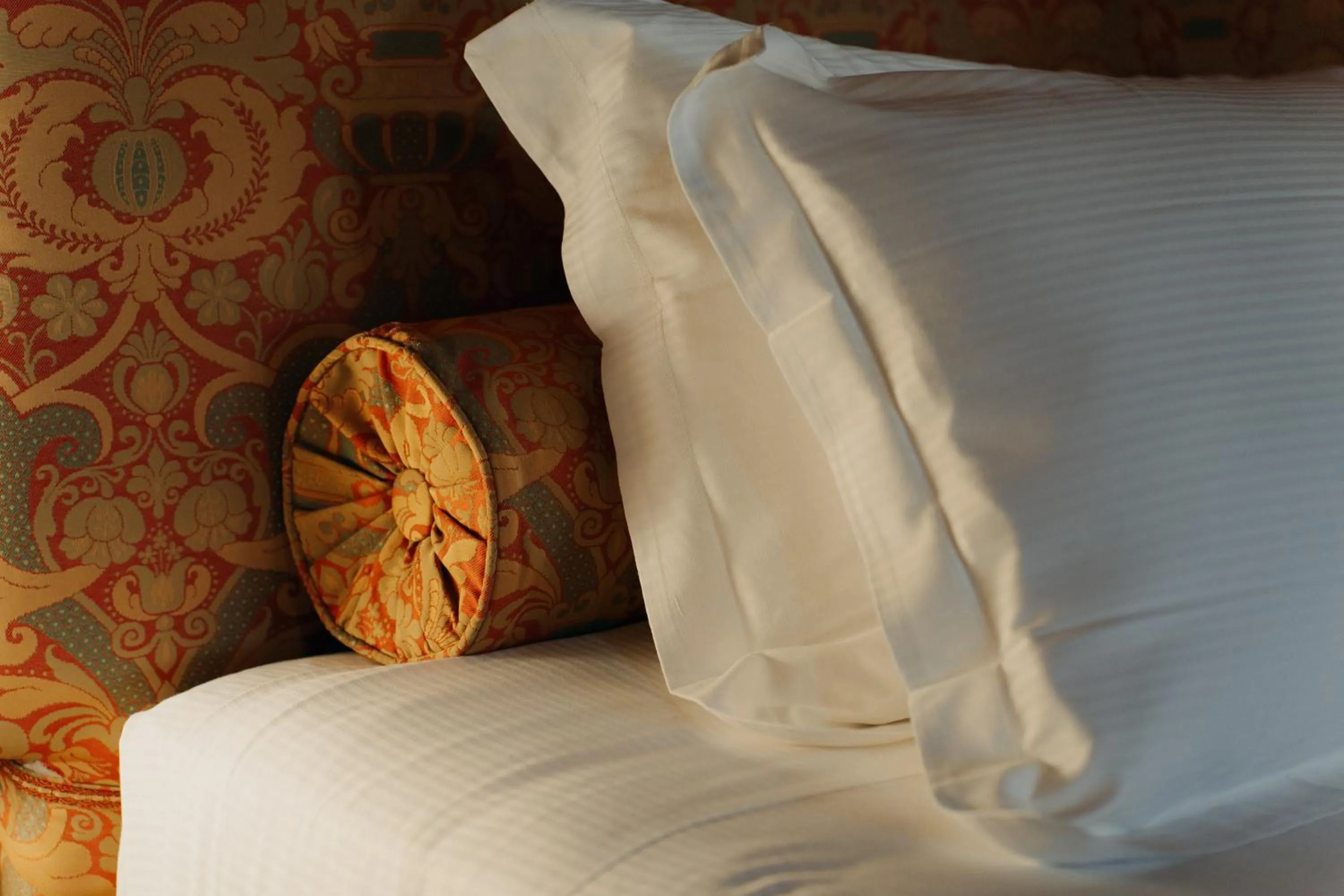 Decorative detail, Bed in Hotel Palazzo Guiscardo Pietrasanta