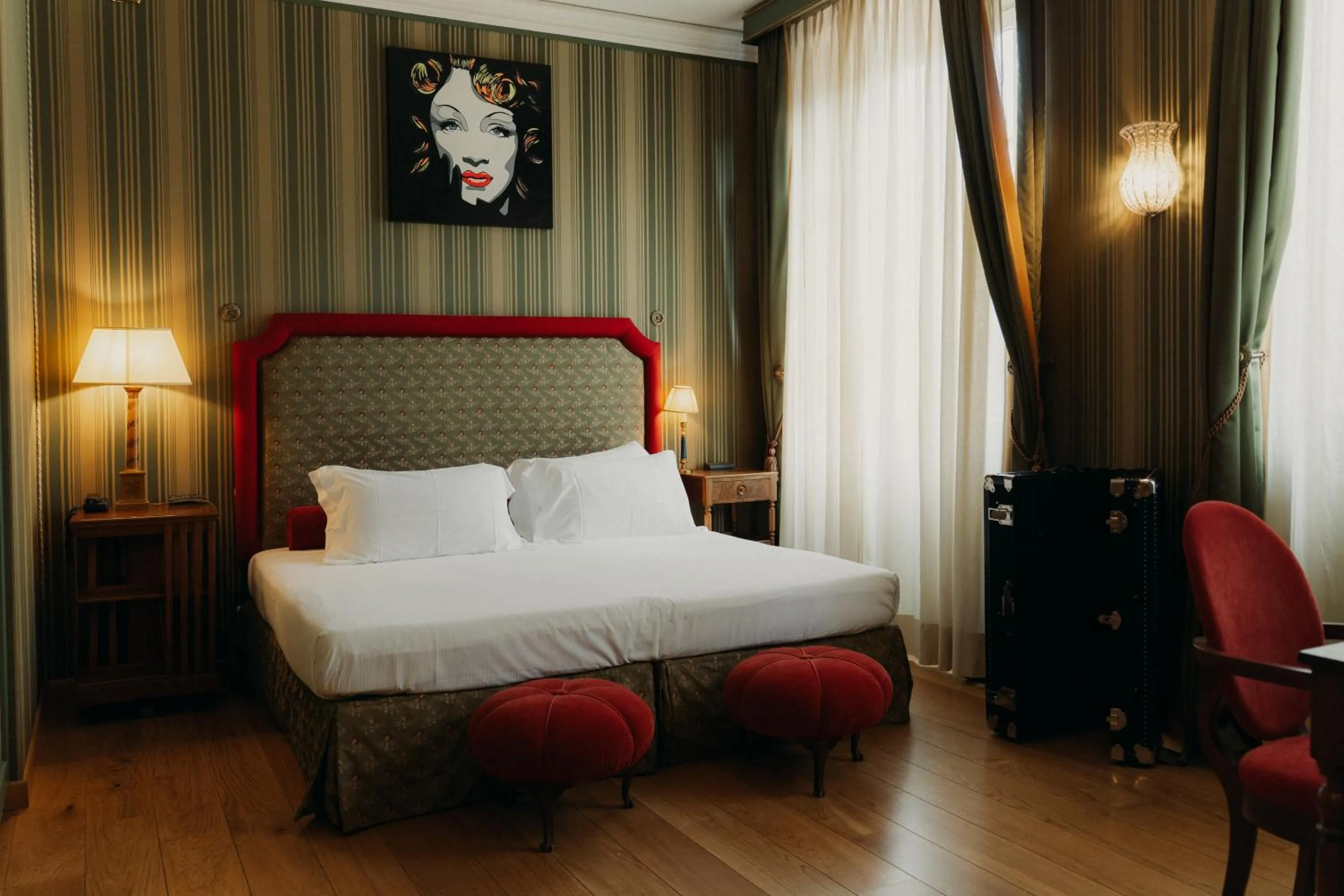 Bed in Hotel Palazzo Guiscardo Pietrasanta