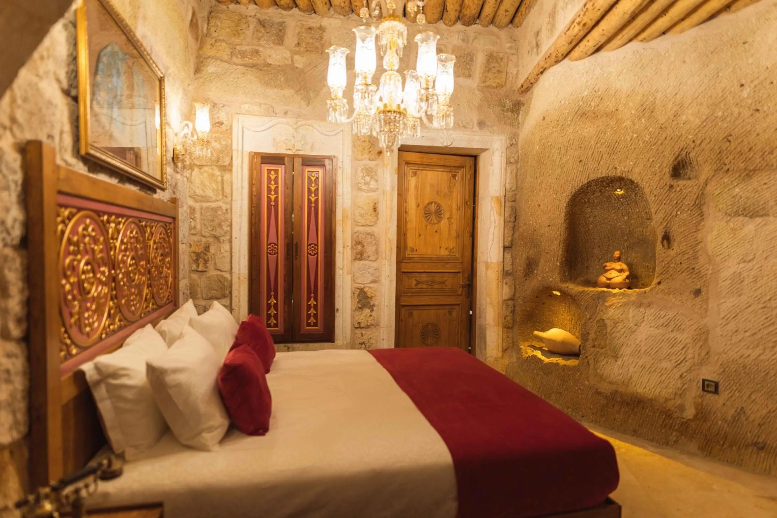 Bed in Solo Cave Suites