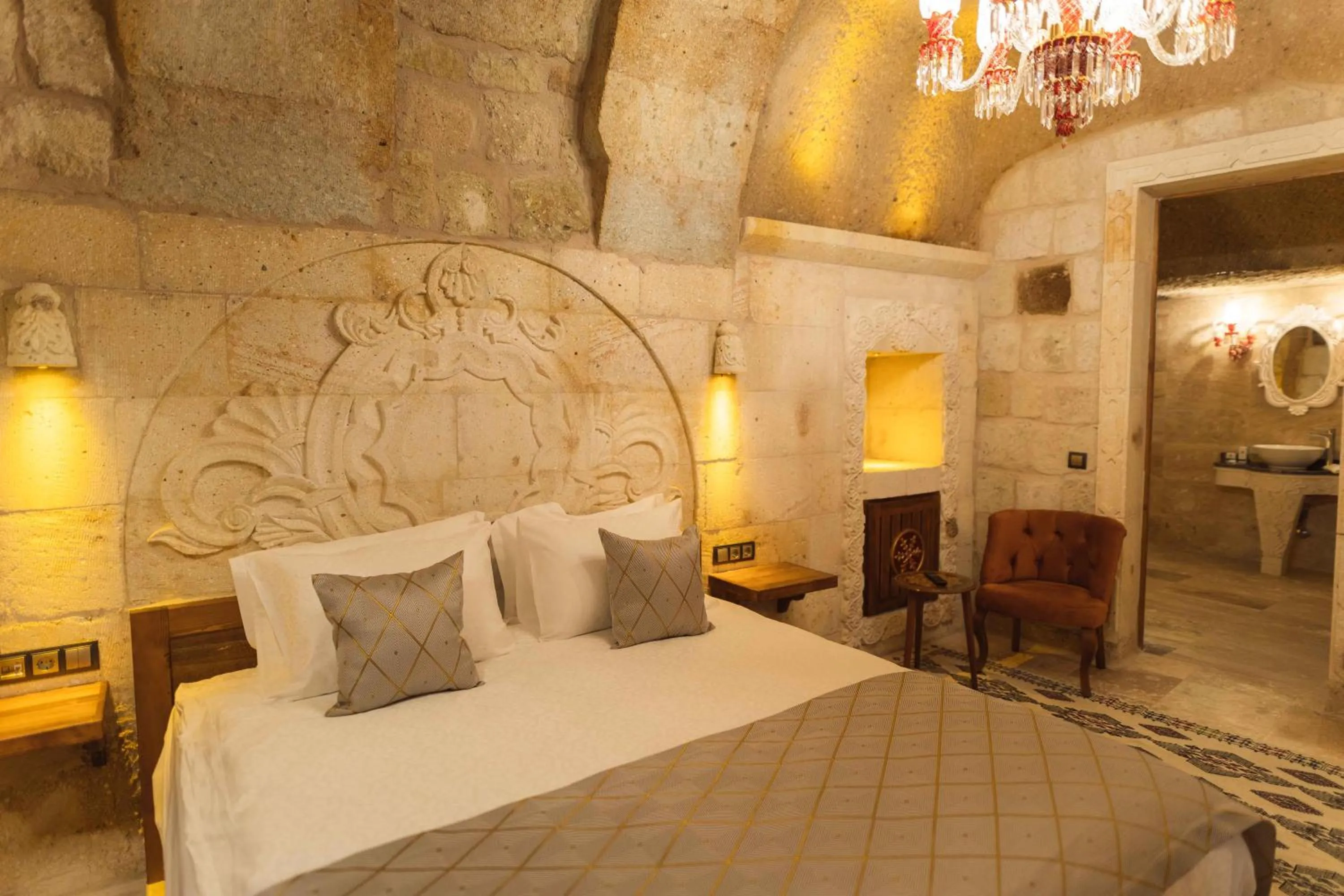 Bed in Solo Cave Suites