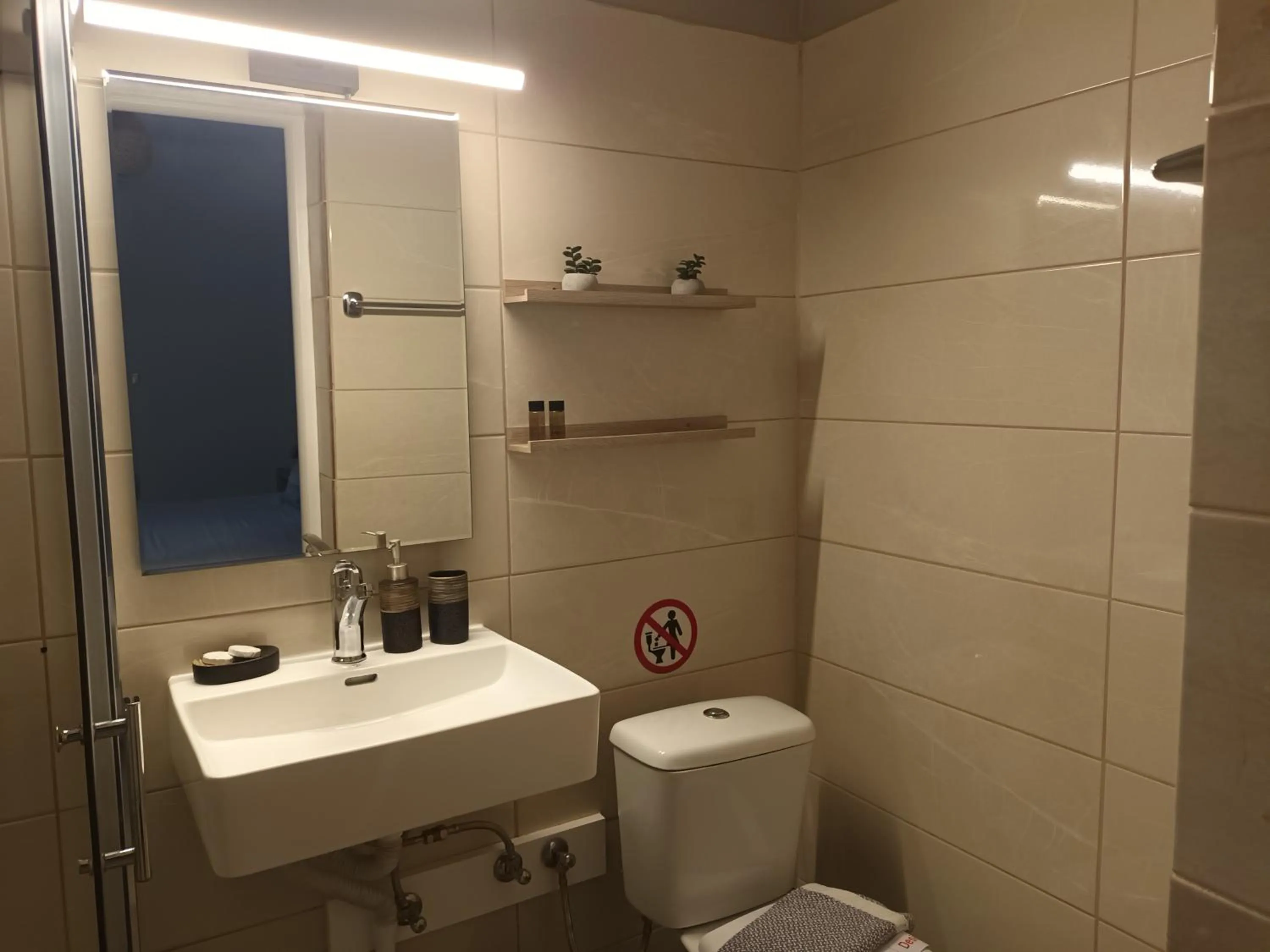 Bathroom in Secret Garden Hotel