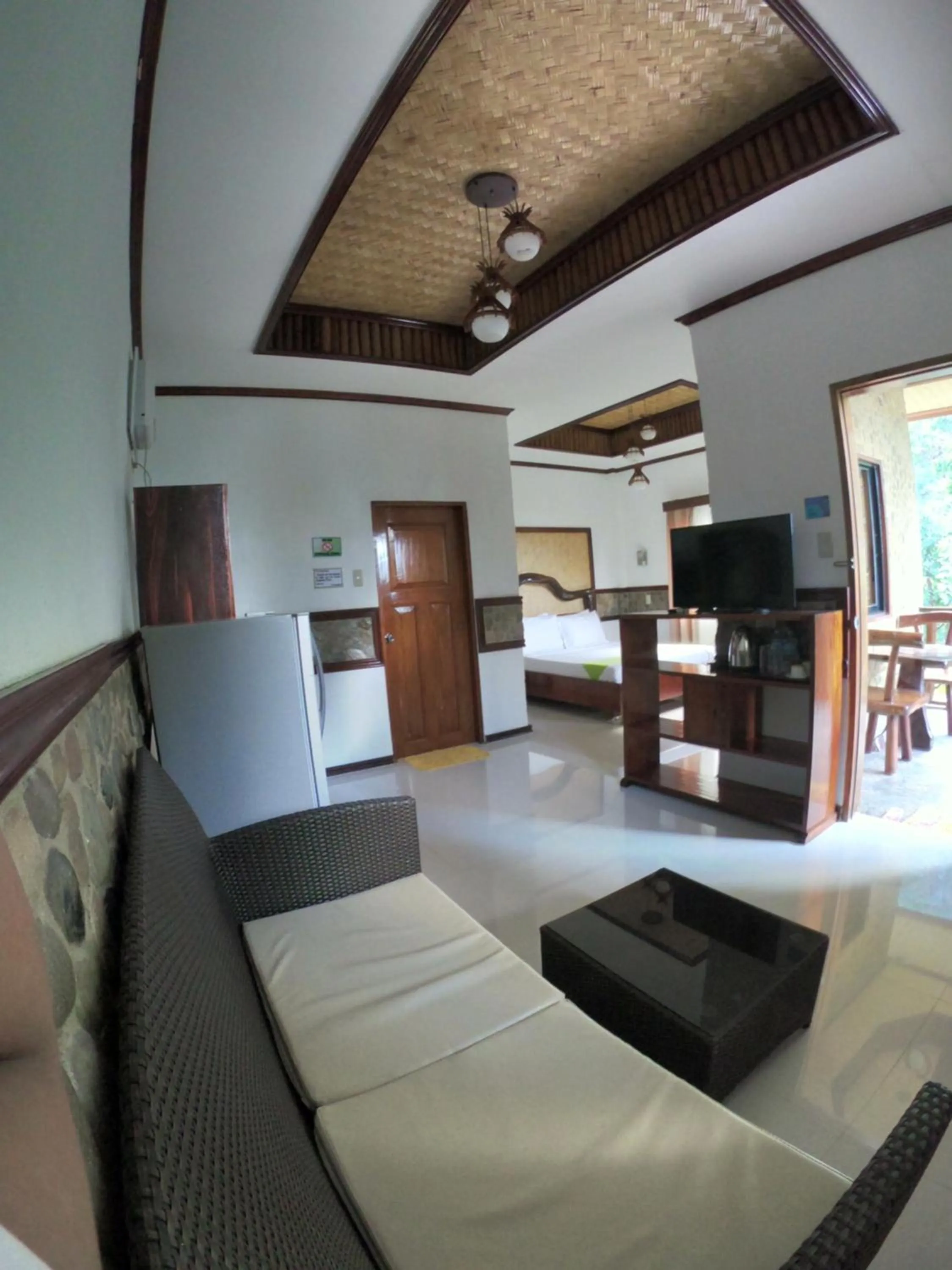 TV and multimedia, Bed in El Nido Viewdeck Cottages