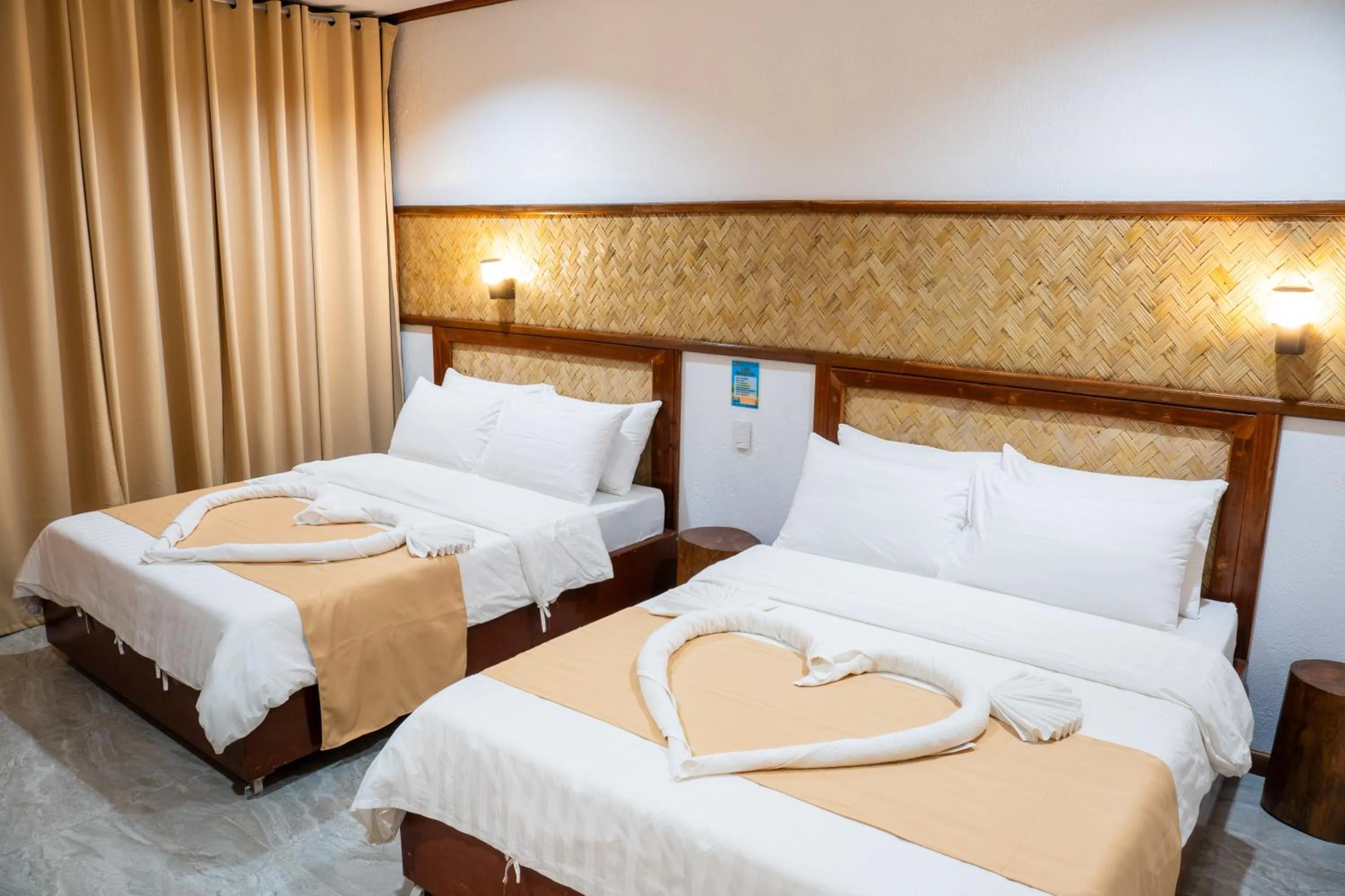 Bed in El Nido Viewdeck Cottages