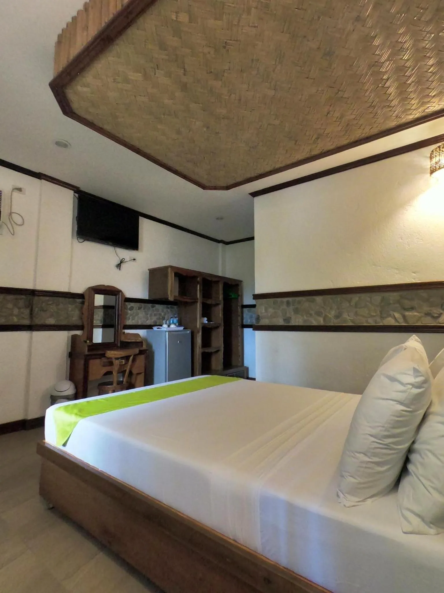 Bed in El Nido Viewdeck Cottages