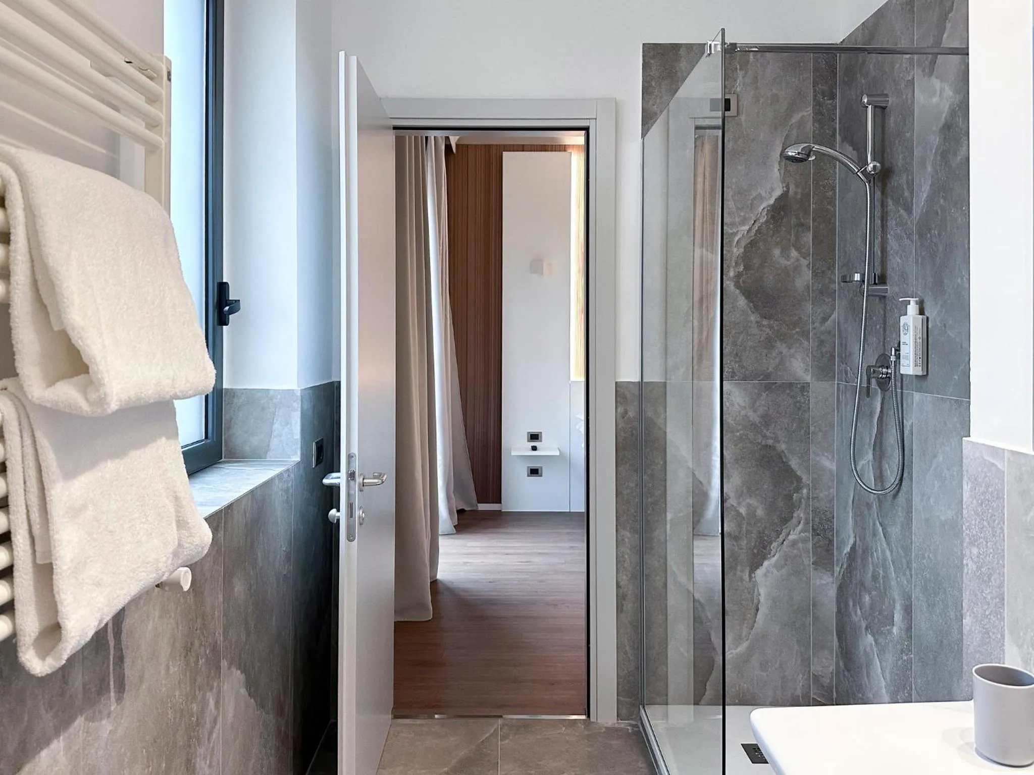Bathroom in Garner Hotel Rome Aurelia by IHG