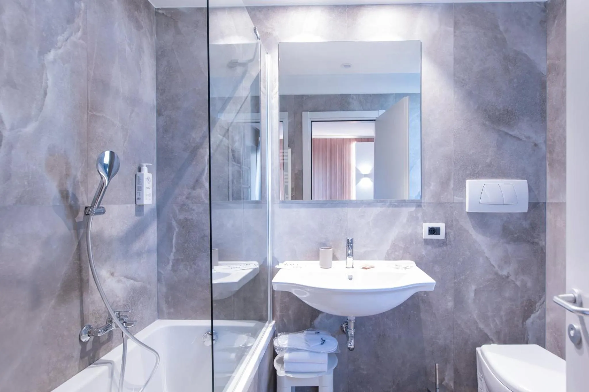Bathroom in Garner Hotel Rome Aurelia by IHG