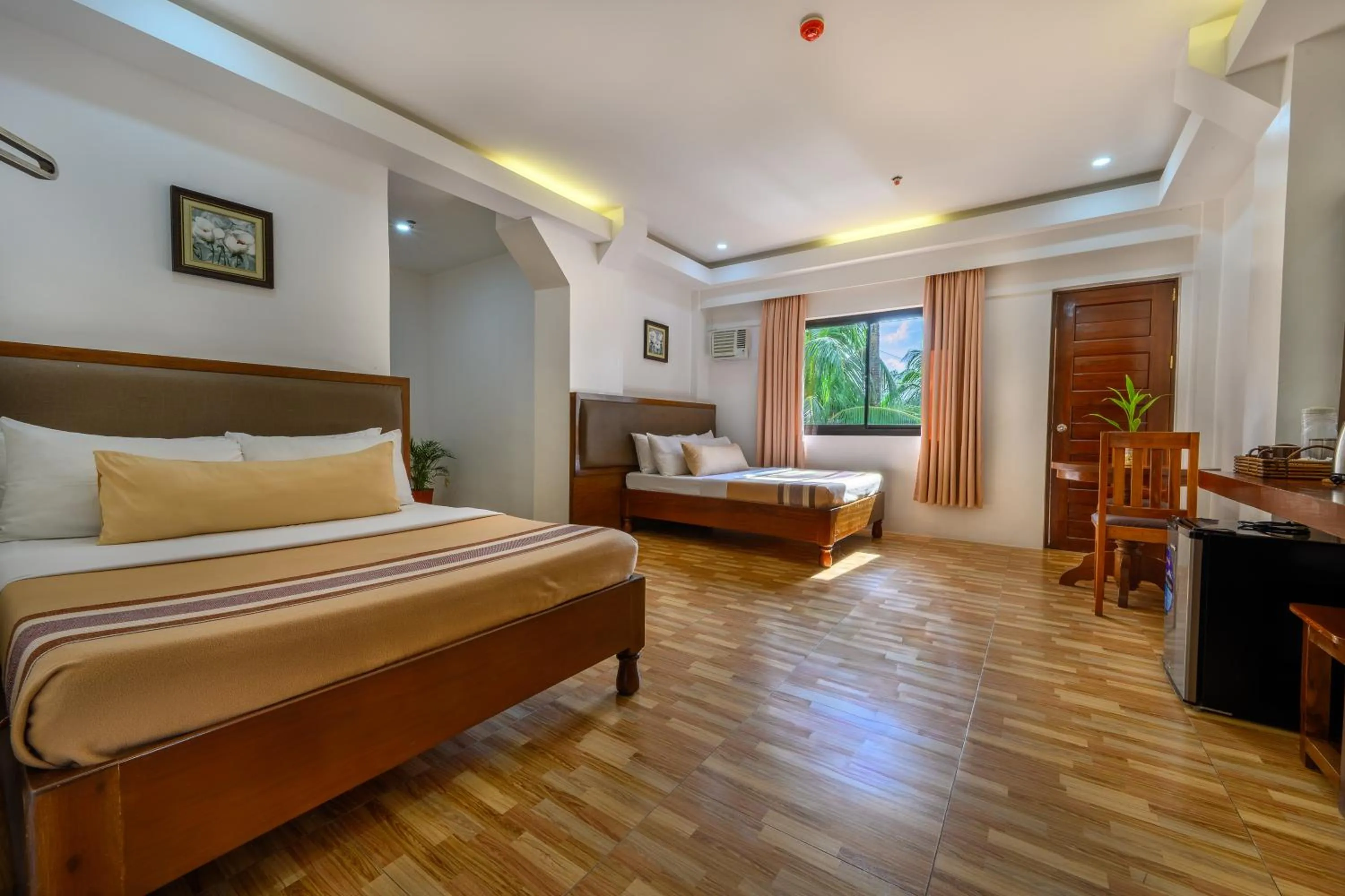 Bed in Jurias Garden Hotel