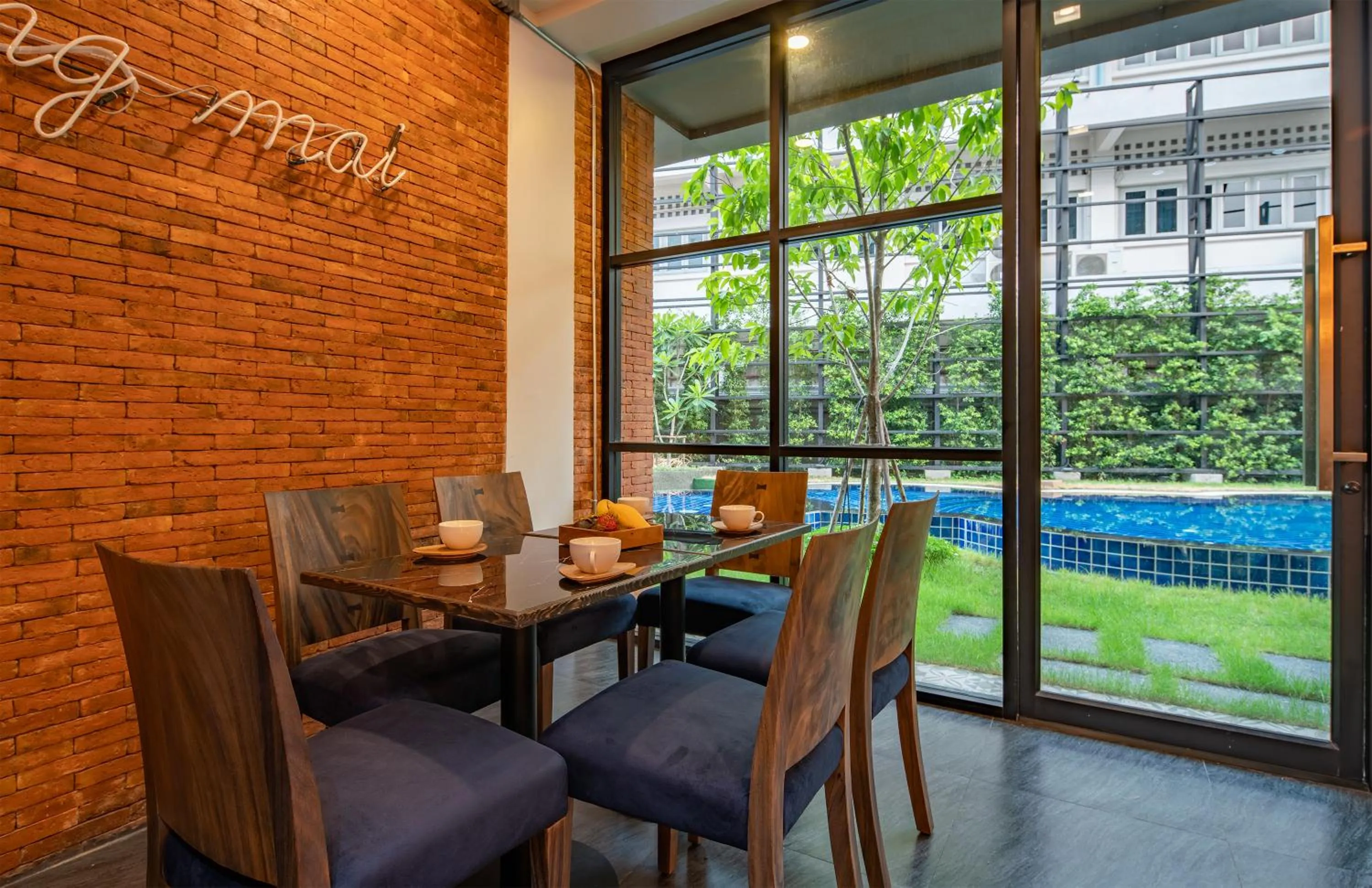 Living room in MOMO Hotel Chiang Mai