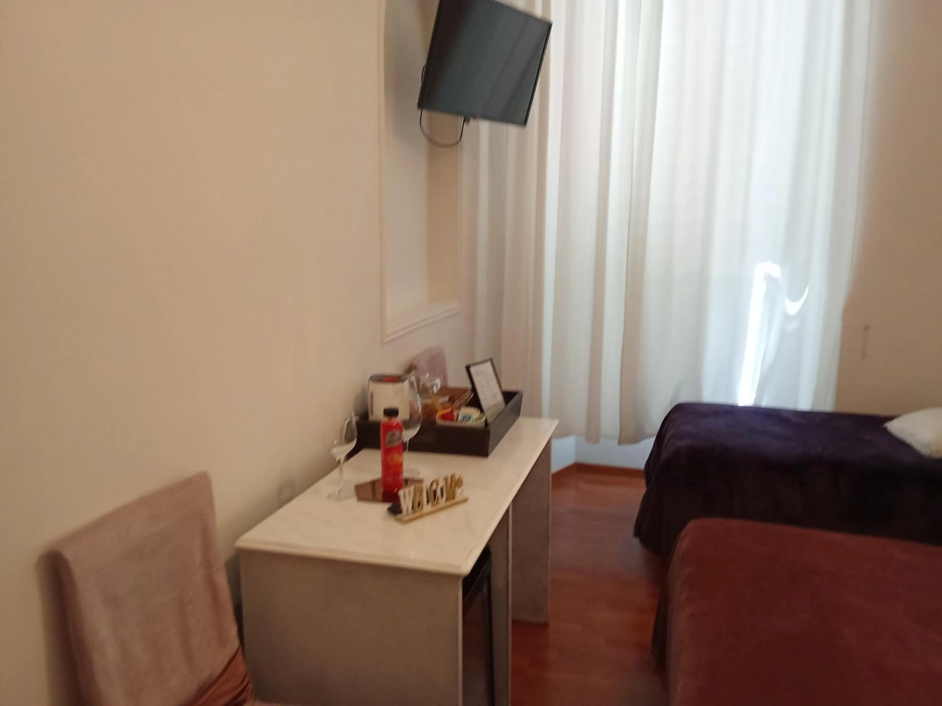 Seating area, Bed in Soggiorno Madrid