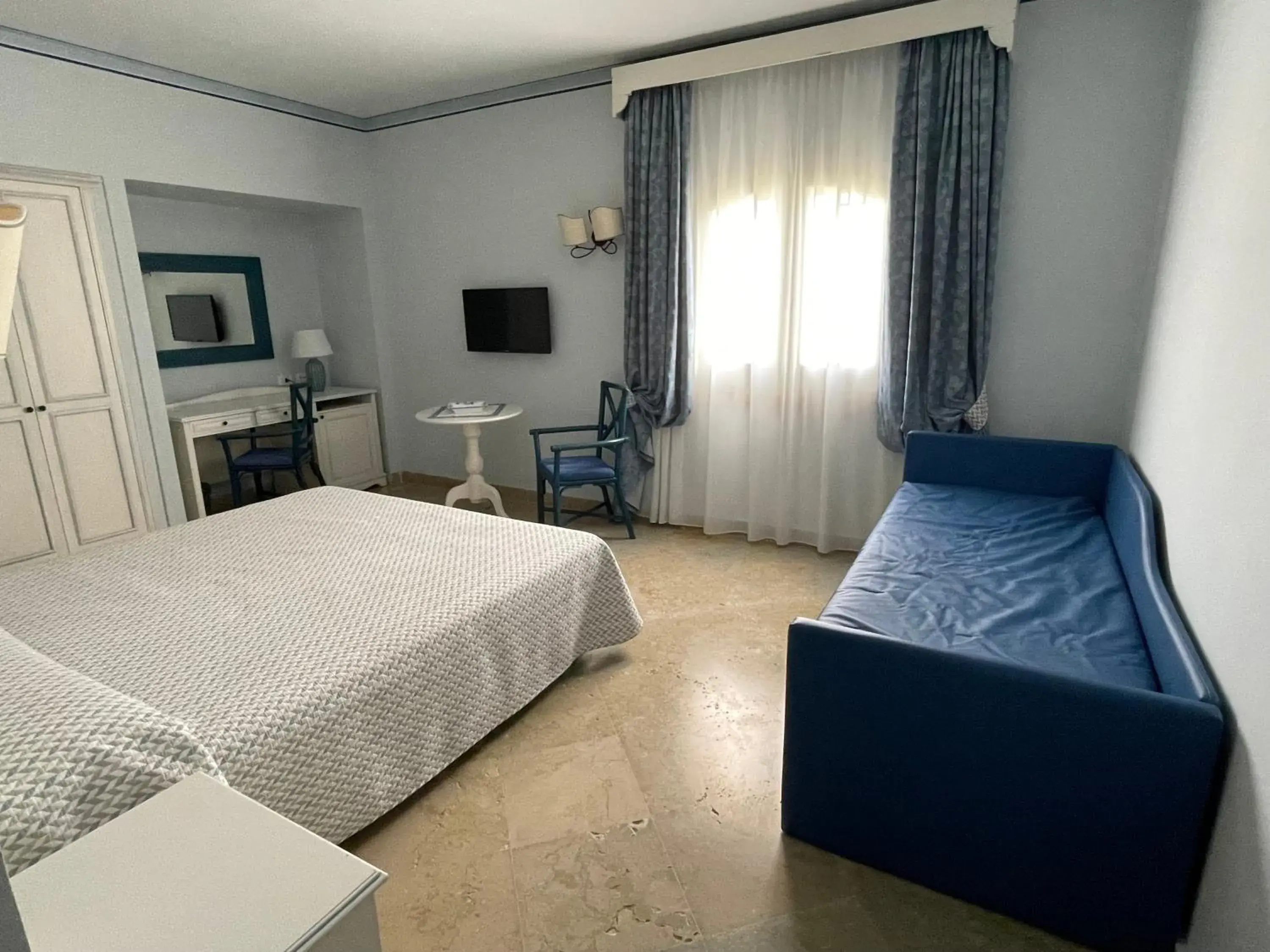 Triple Room with Garden View in Relais Antiche Saline Triple Room with Garden View in Relais Antiche Saline